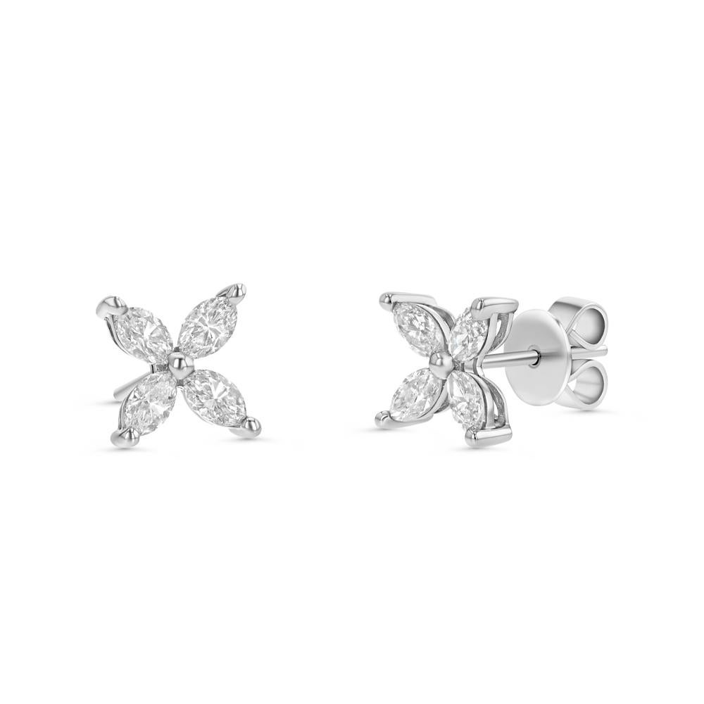 Four marquise cut diamonds come together in 18 karat white gold to form our elegant Diamond Flower Studs. Simple, sleek, and gorgeous, these studs are perfect for any occasion. 


(18k white gold and 8 white diamonds = 0.98cts)