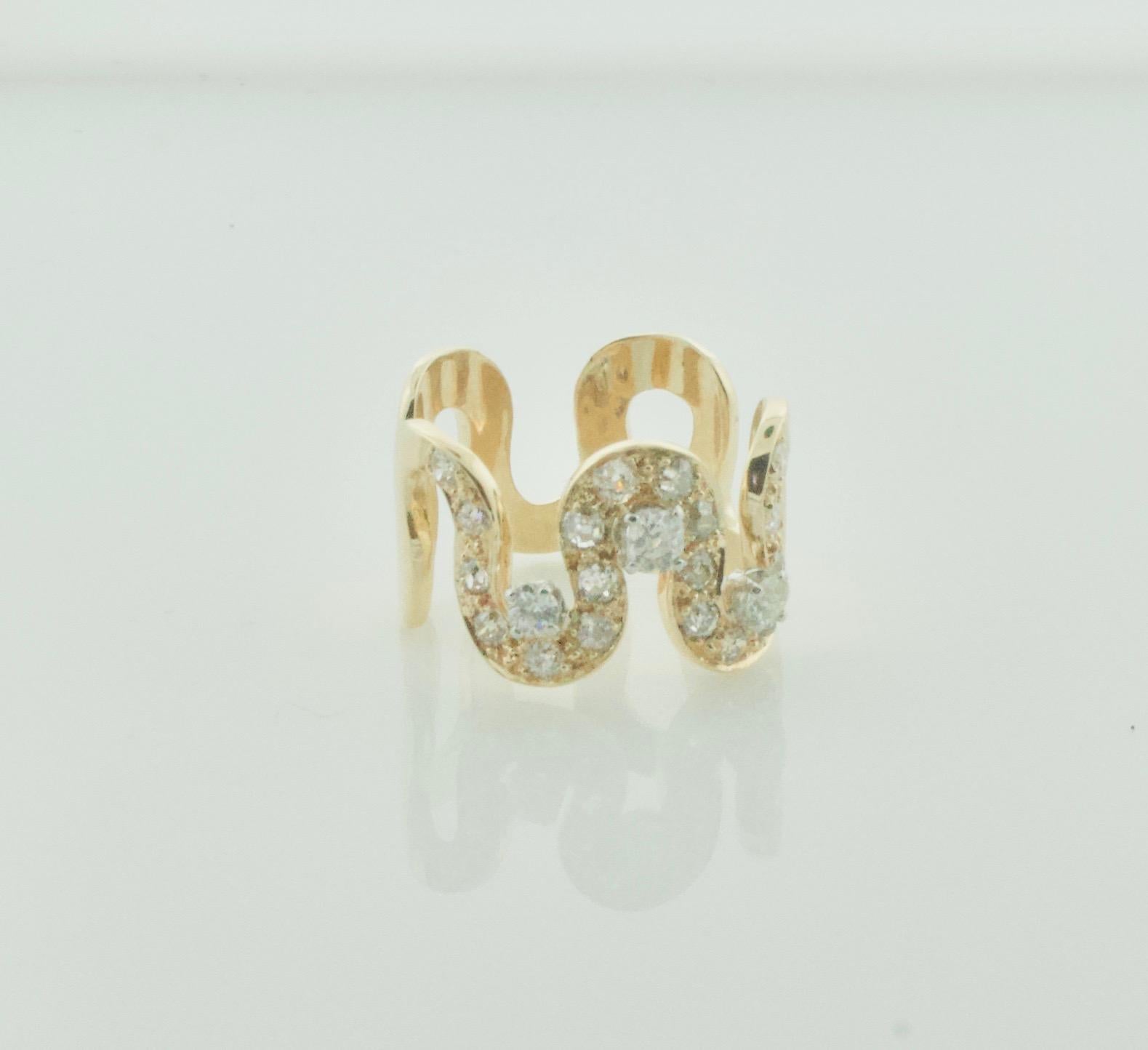 Diamond Free Form Diamond Ring Circa 1960's in Yellow Gold
Composed of 21 Old Mine and Round Cut Diamonds Weighing .75 carats.
This Ring Harkens Back To The Swingin' 1960's.  
During this Decade Many Art Deco Pieces Were Broken up to Make New