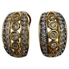 Pendientes de diamantes de oro amarillo de 14 quilates con dorso francés