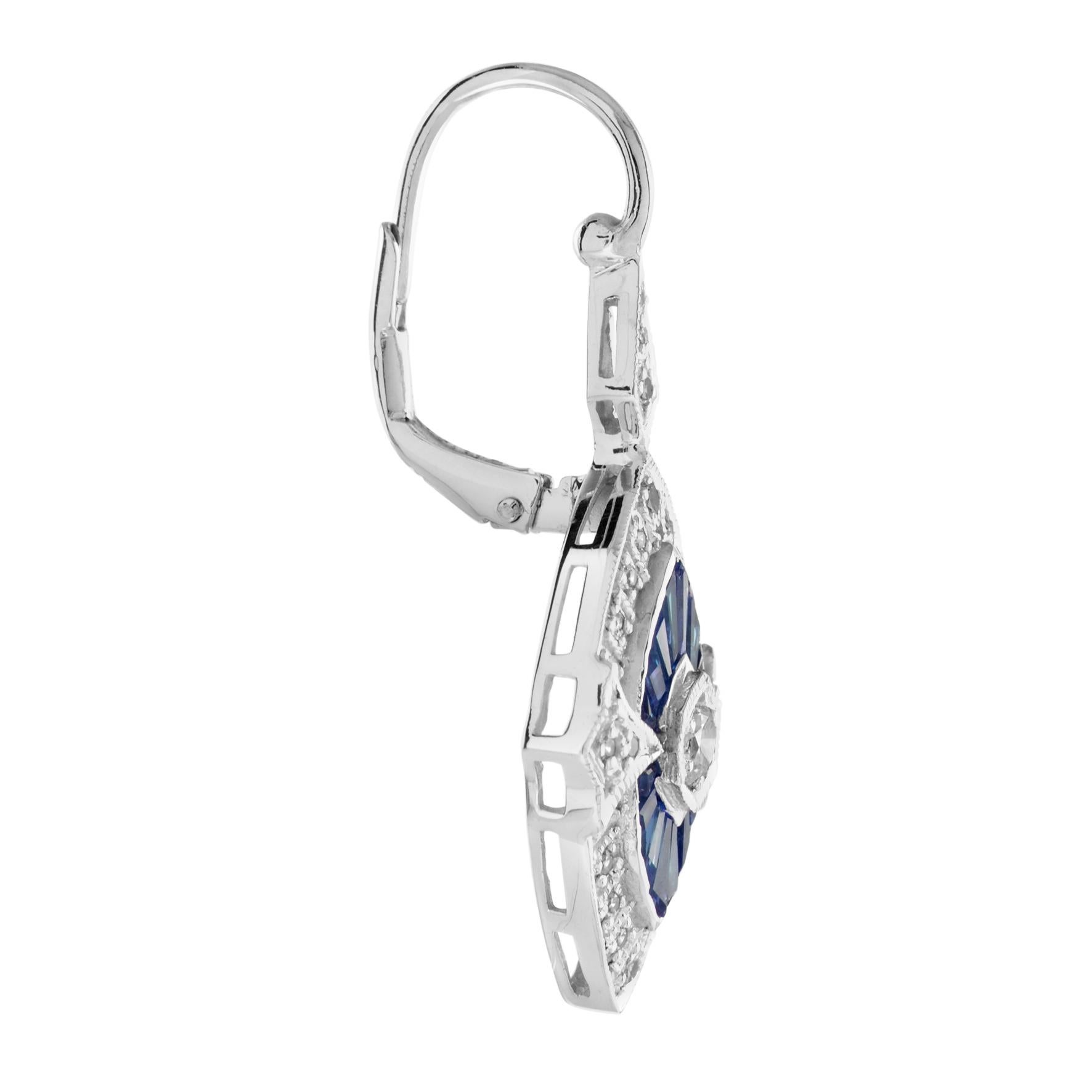 She will adore the Art Deco style brilliant sparkle of these romantic diamond and natural sapphire drop earrings. Crated in gold with a millgrain setting, each light-catching dangle features a marquise-shaped composite of round diamonds and