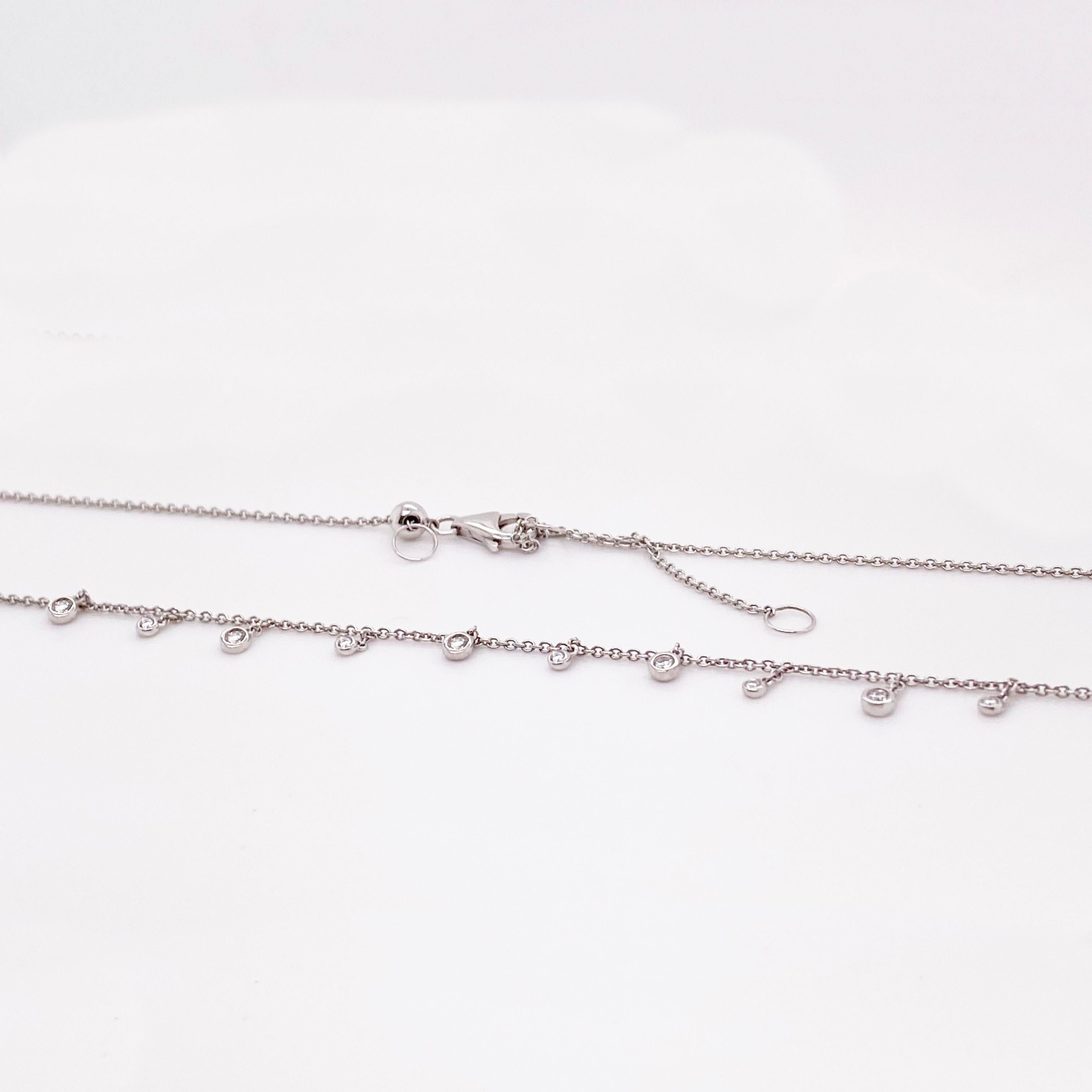 The diamond fringe necklace is adorable on anyone!  The 14 karat cable chain has 15 total diamonds that dangle and provide a fringe for the chain. This is the updated diamonds by the yard as the dangle diamonds is what many current designers are