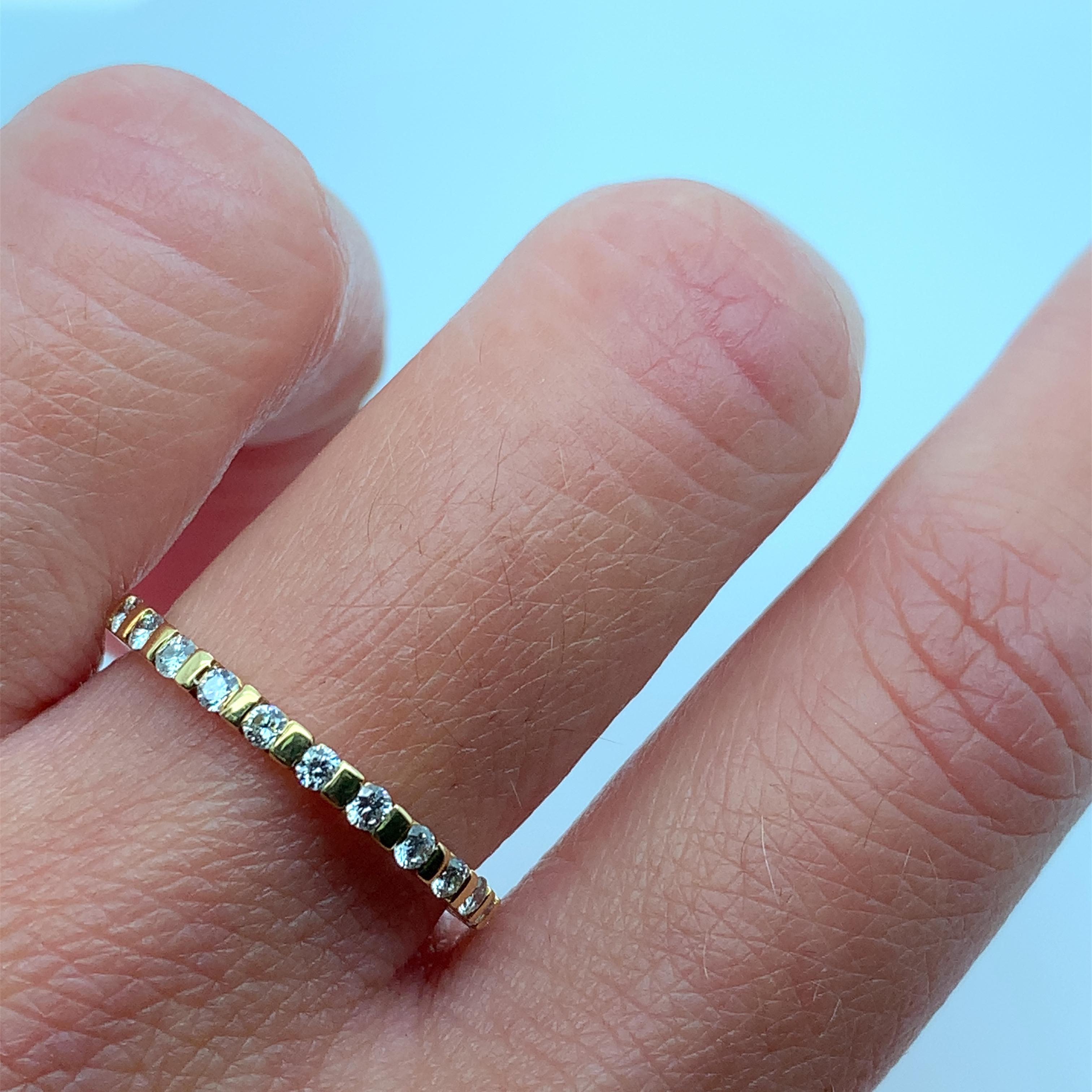 
0.80ct Diamond full eternity wedding band engagement ring in 18k yellow gold.

Classic full diamond wedding ring in 18ct yellow gold.

Diamonds total weight 0.80ct F colour VS1 clarity.

The ring can be resized.

Hallmarked

Box and valuation