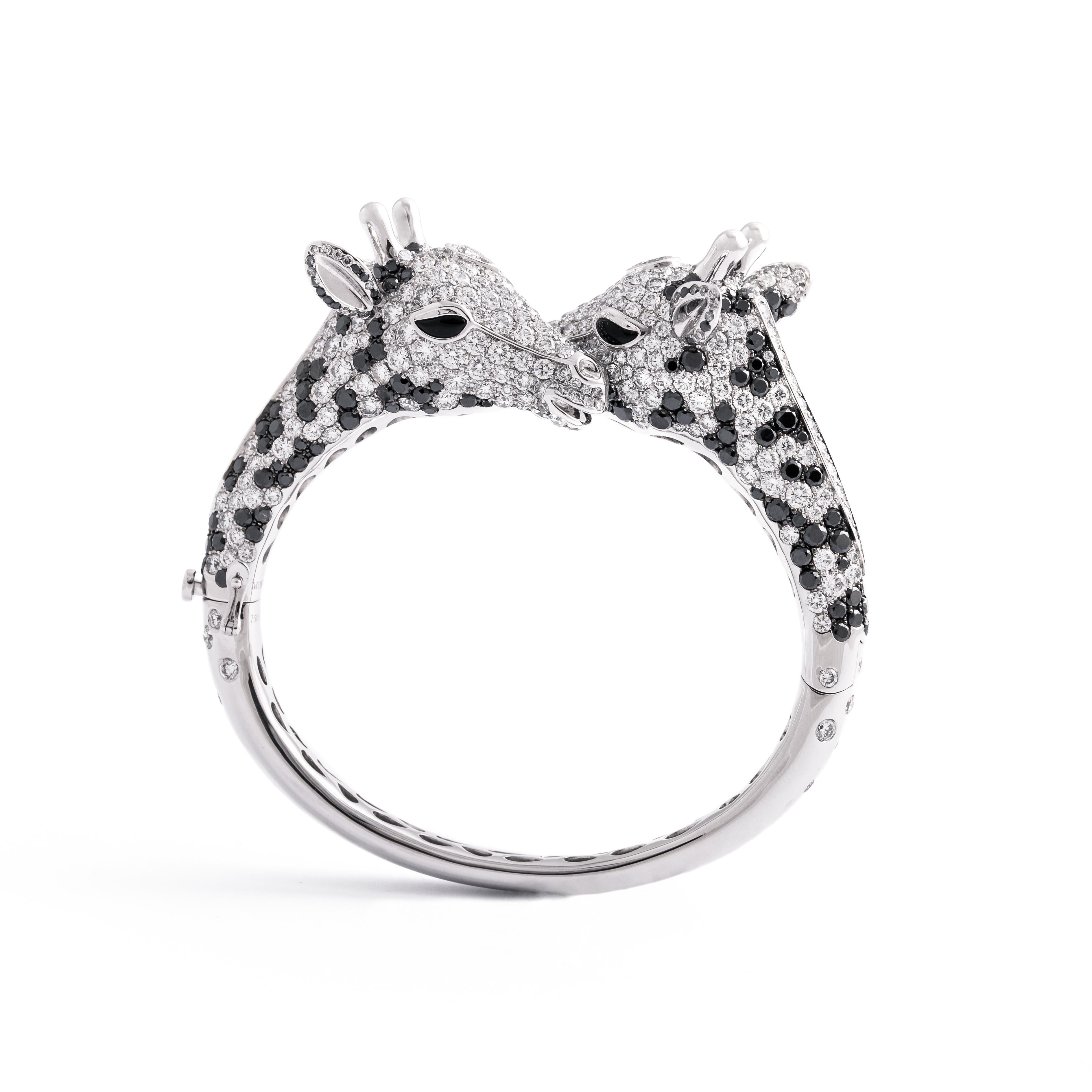 Giraffe bangle in 18kt white gold set with 553 diamonds 16.80 cts and 218 black diamonds 7.83 cts, 2 pear-shaped diamonds 0.55 cts and 4 onyx 0.44 cts              

Total weight: 54.70 grams