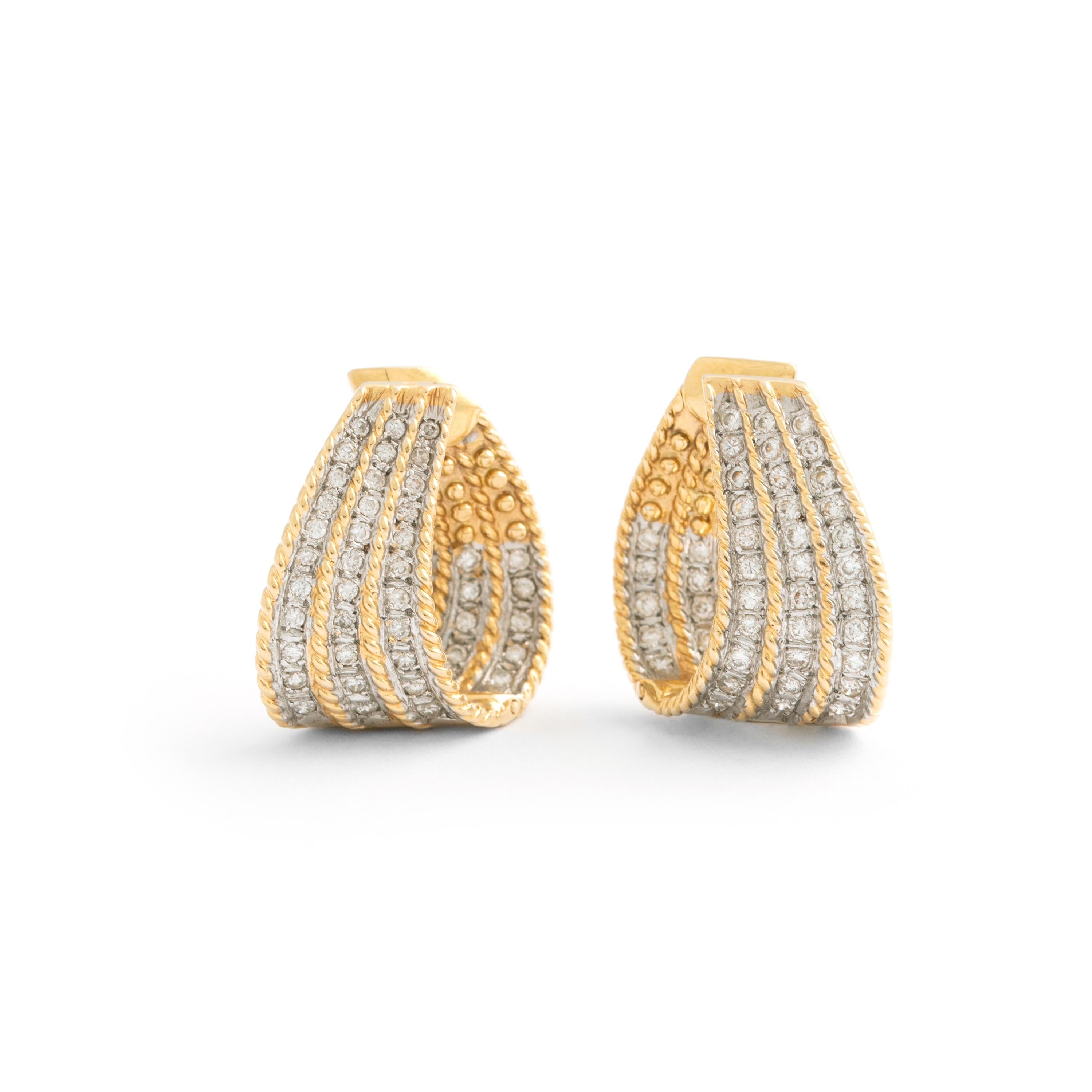 Diamond White and Yellow Gold 18K Earclips.
Gross weight: 10.44 grams.