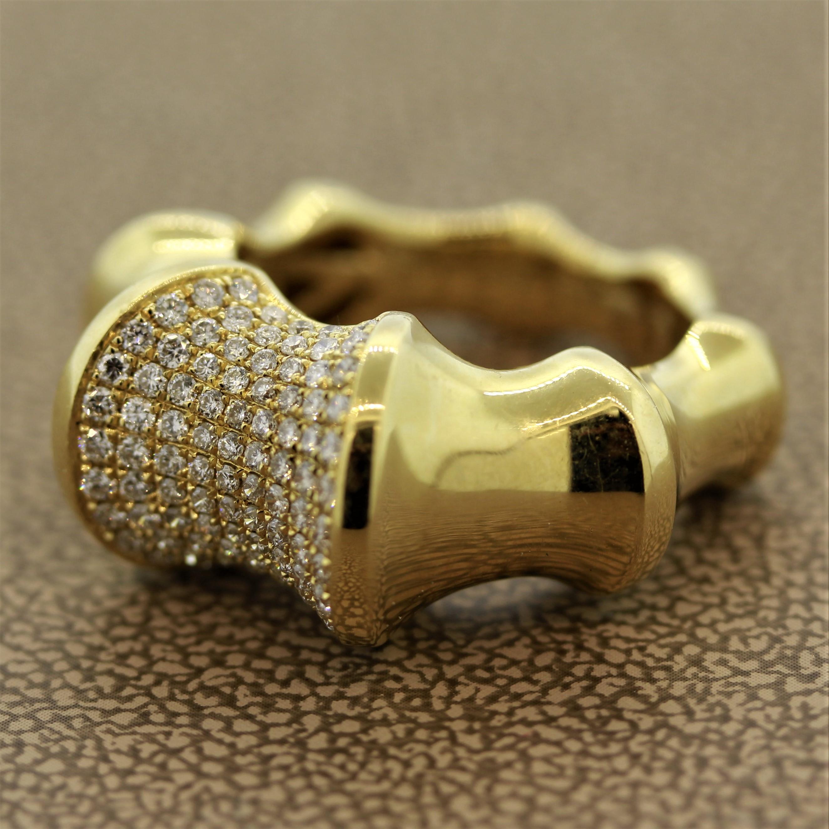Ein stilvoller Goldring mit 0,82 Karat Diamanten im runden Brillantschliff. Sie sind in einen Ring aus 18 Karat Gold eingefasst, der wie das natürliche Wachstumsmuster des Bambus geformt ist!

Ring Größe 6.50