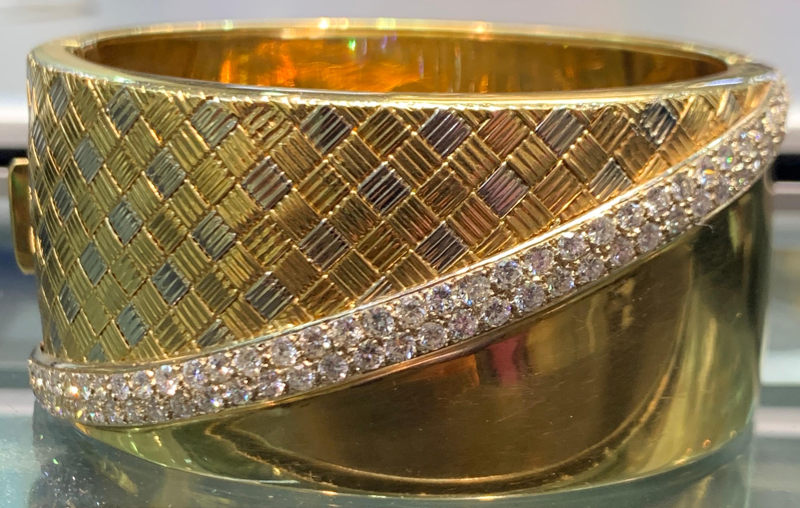 Diamond & Gold Bangle Cuff Bracelet
Gold Type:
74 diamonds total 
Diamond Weight: 3.70 Cts
78 grams
Measurements: diameter: 2.25