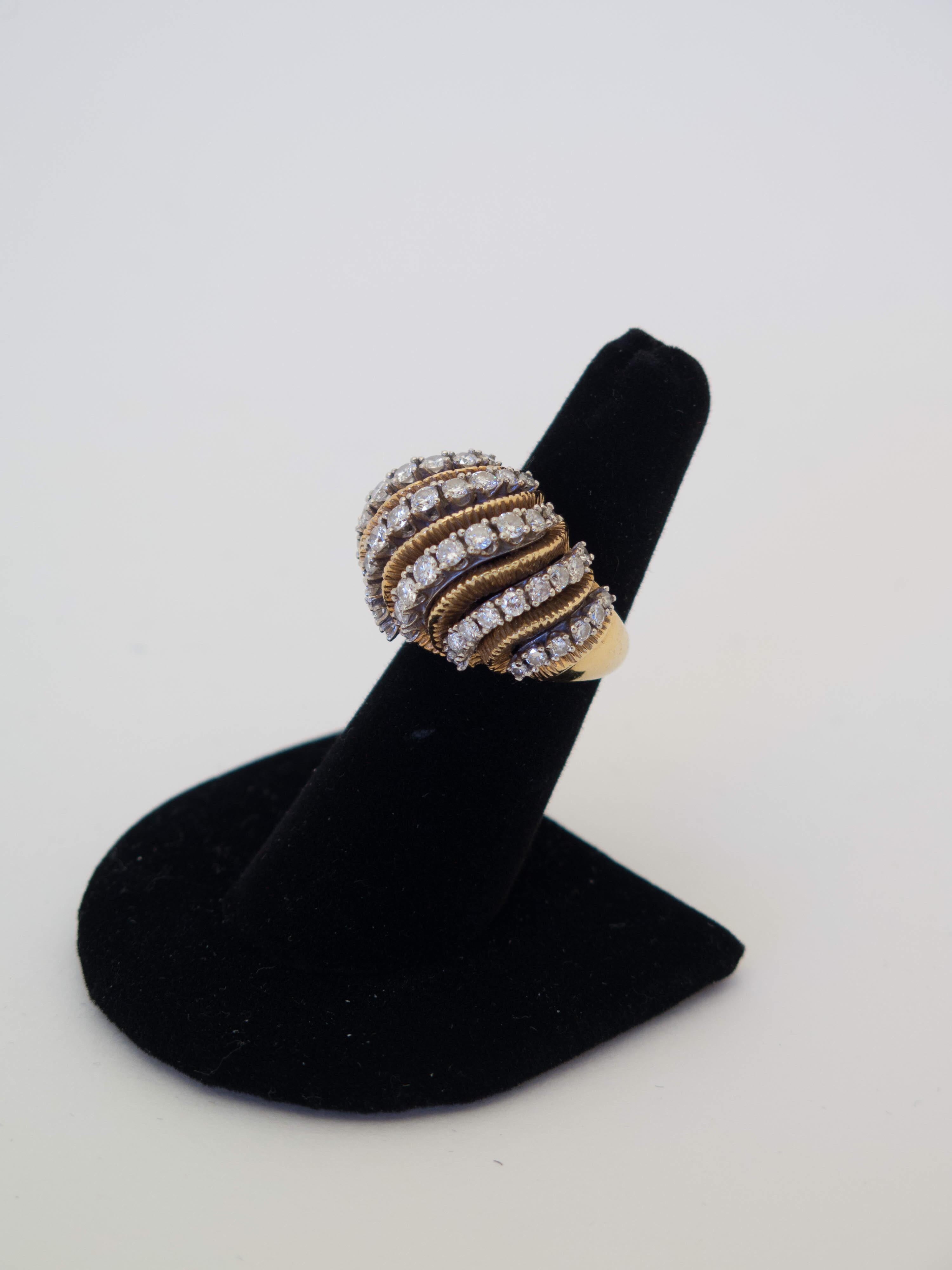 Circa 1960's organic-form bombe diamond, 18K yellow gold ring. There are 59 round brilliant-cut diamonds set in white gold. Total weight of diamonds approximate 2.85 carats, G-H color, Vs-Sl clarity. Stamped 18K