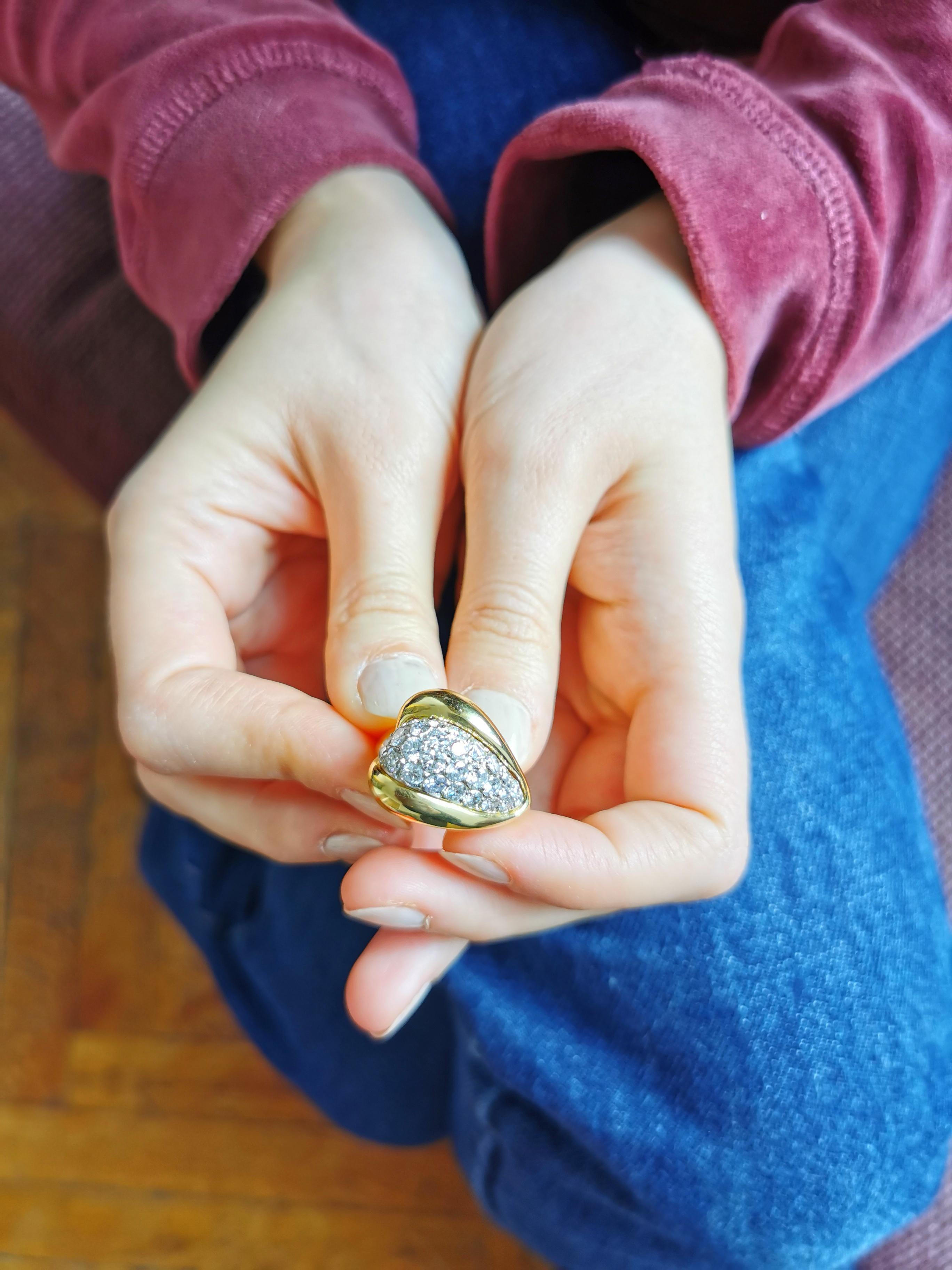 Boule ring, generous and voluptuous volume. This beautiful ring illuminates and emphasizes
the feminine silhouette with its white diamonds pave-set.
18k yellow and white gold,  
finger size: 6.5 or 53 can be sized. French assay mark and signed
White