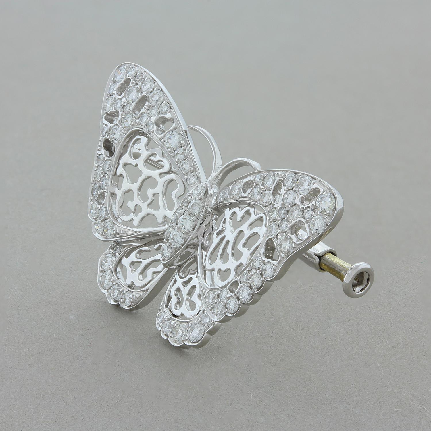 This everyday butterfly brooch features 0.86 carats of VS quality round cut diamonds. The flying butterfly is set in 18K white gold with lace wings for a soft finish. Can be worn on a shirt or jacket.  

Brooch Length: 0.75 inches
Brooch Width: 1.25