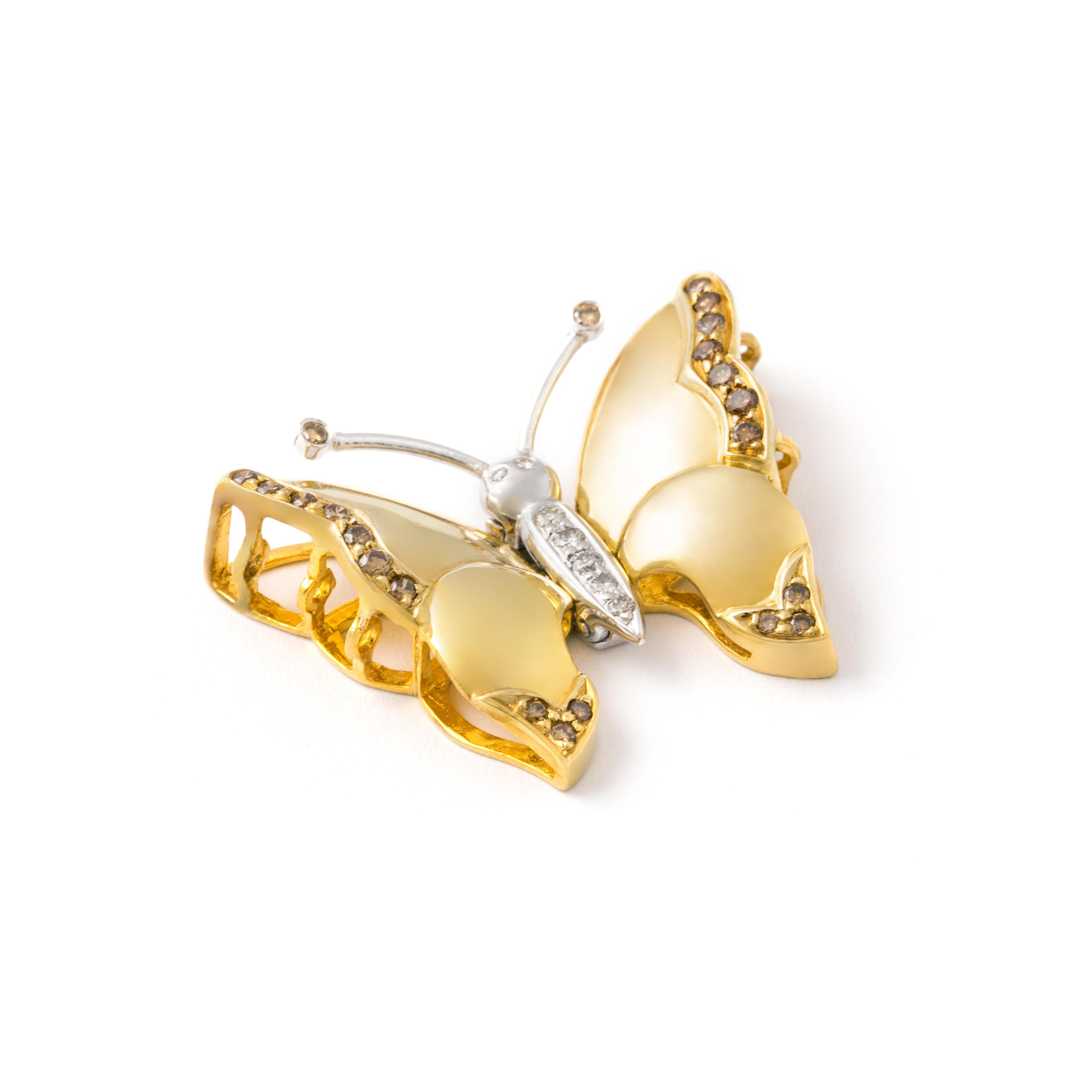 Diamond and yellow/white Gold Clasp designed as a stylized butterfly adaptable for necklace and bracelet.

Total length: approx. 3.00 centimeters.
Total width: approx. 3.20 centimeters.
Total weight: 14.39 grams.