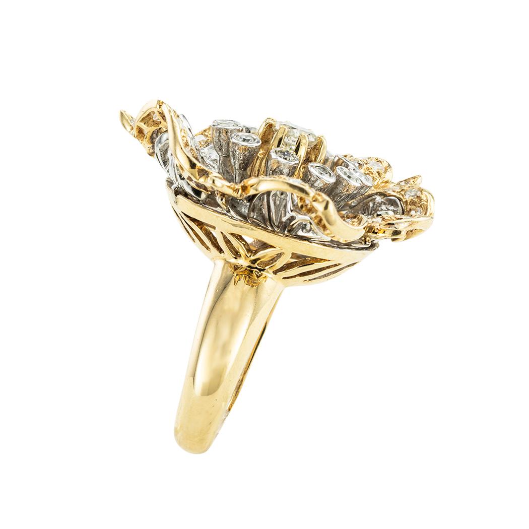 Diamond and gold camellia flower cocktail ring circa 1980. *

ABOUT THIS ITEM:  #R-DJ47C. Scroll down for detailed specifications.  The intricate design resembles a camellia flower.  Its petals are set with glittering diamonds.  Exceptional