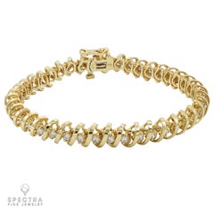 14kt Yellow Gold Coil Bracelet with 42 Diamonds, 3.78 Carats, USA