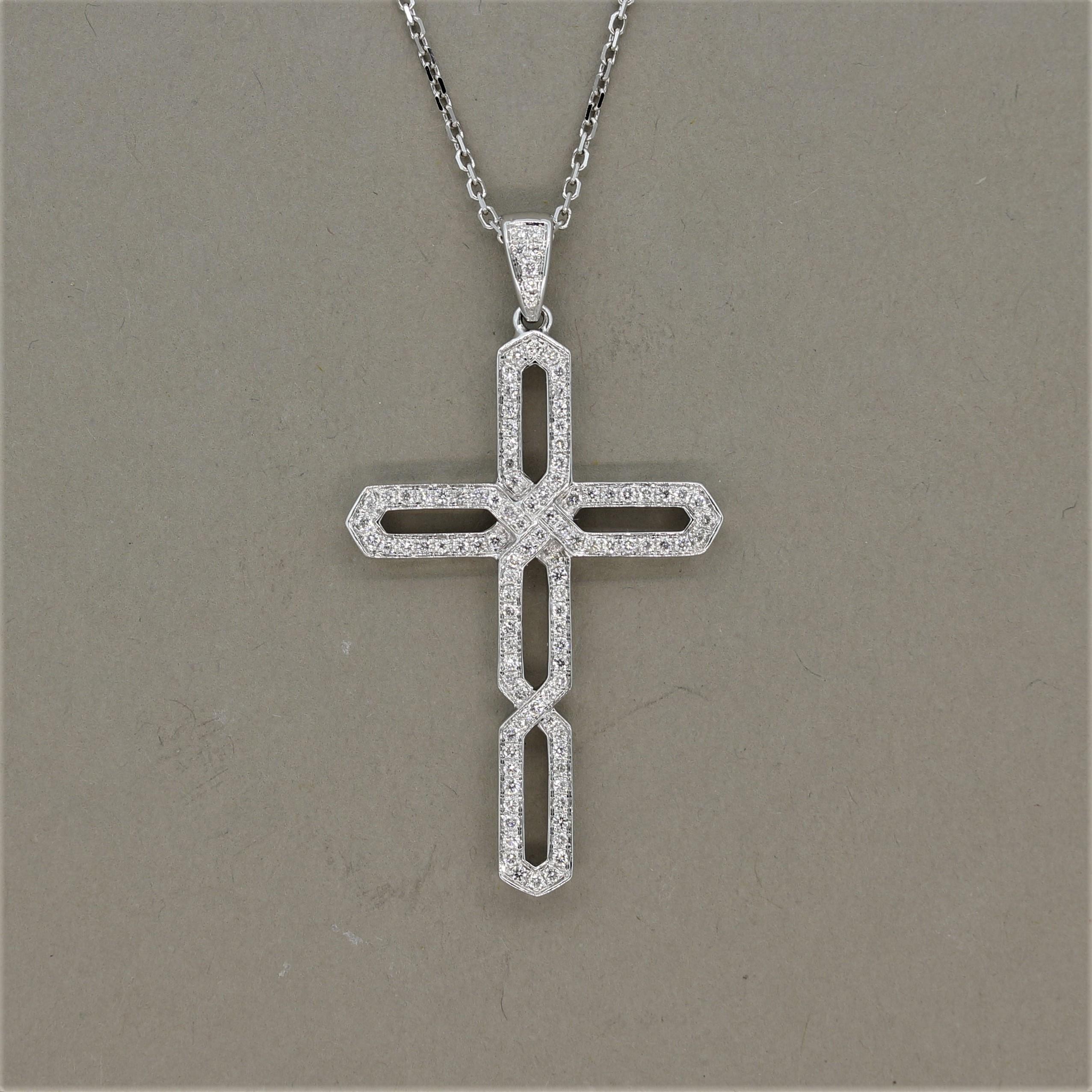 A lovely diamond studded cross! It features 0.58 carats of round brilliant cut diamonds set in 18k white gold. The cross has a unique design while maintaining the correct measurements for a holy cross!

Pendant Length: 1.9 inches

Chain Length: 18