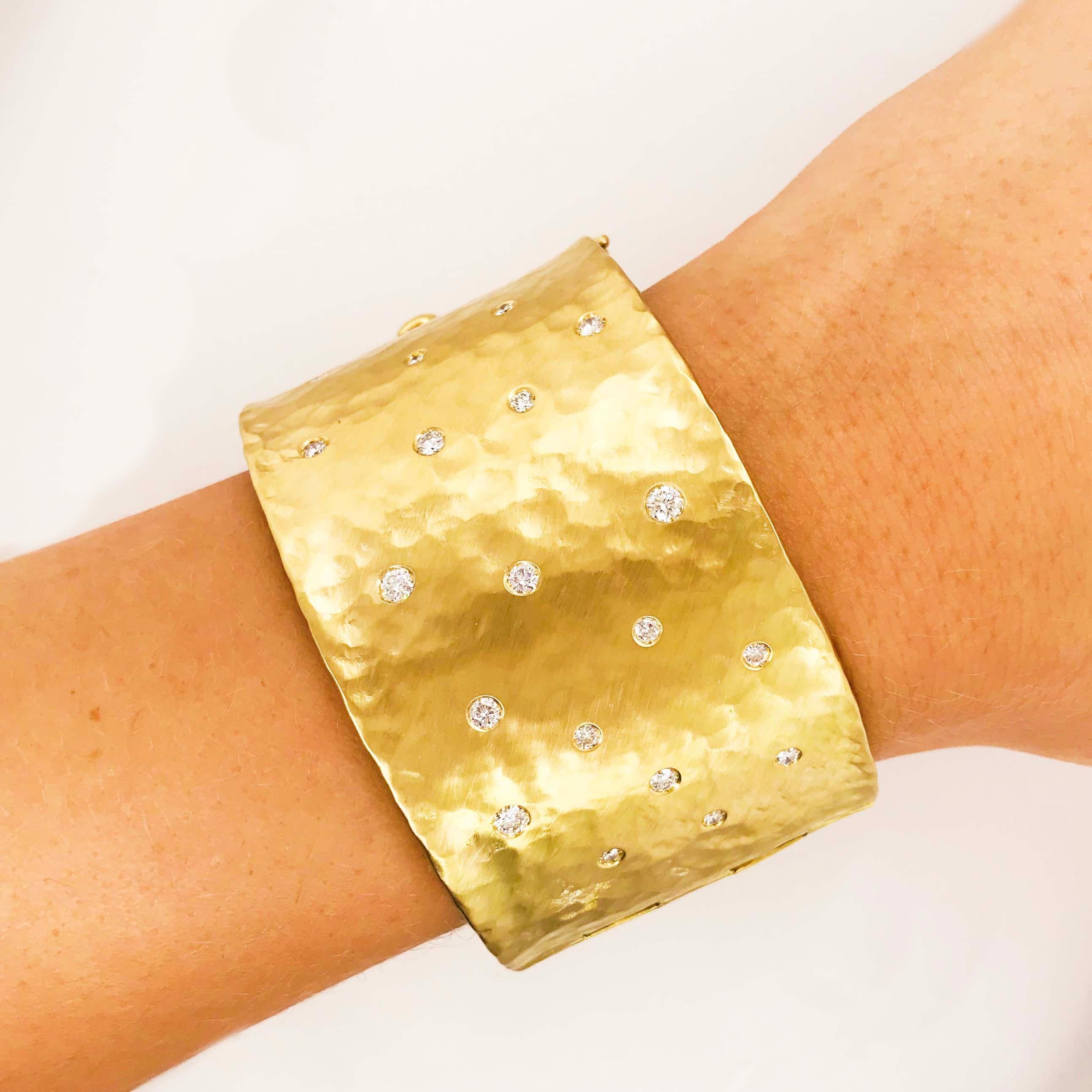 The gorgeous hammered finish and satin texture diamond cuff bracelet is a statement piece! The gold construction on this bracelet is so durable and sturdy!  With natural, genuine round brilliant diamonds that are gypsy set in an organic pattern on