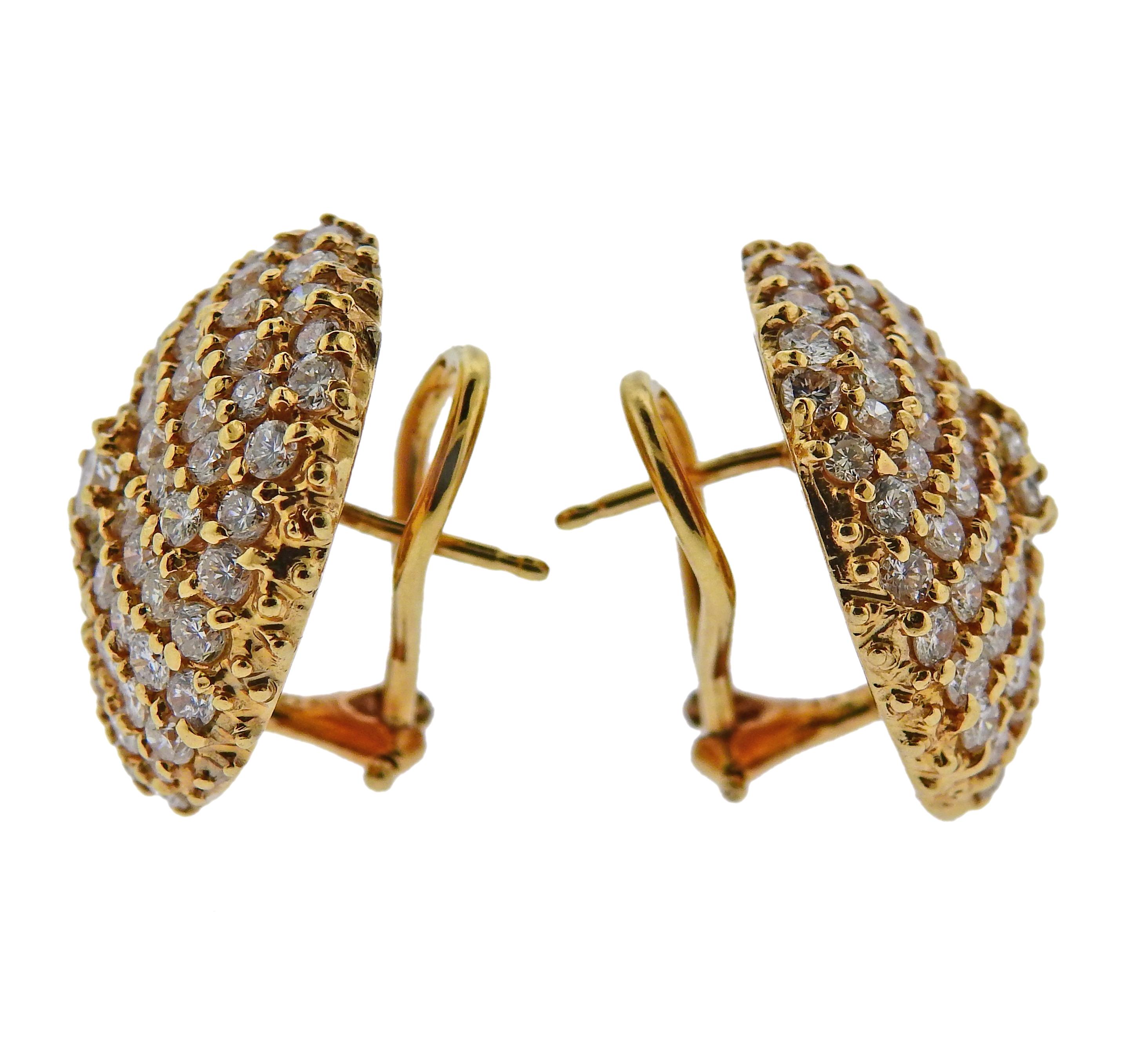 Pair of 14k gold round earrings, set with approx. 3.50ctw in diamonds. Earrings are 22mm in diameter. Marked 14k, weigh 16.9 grams.

SKU#E-02755