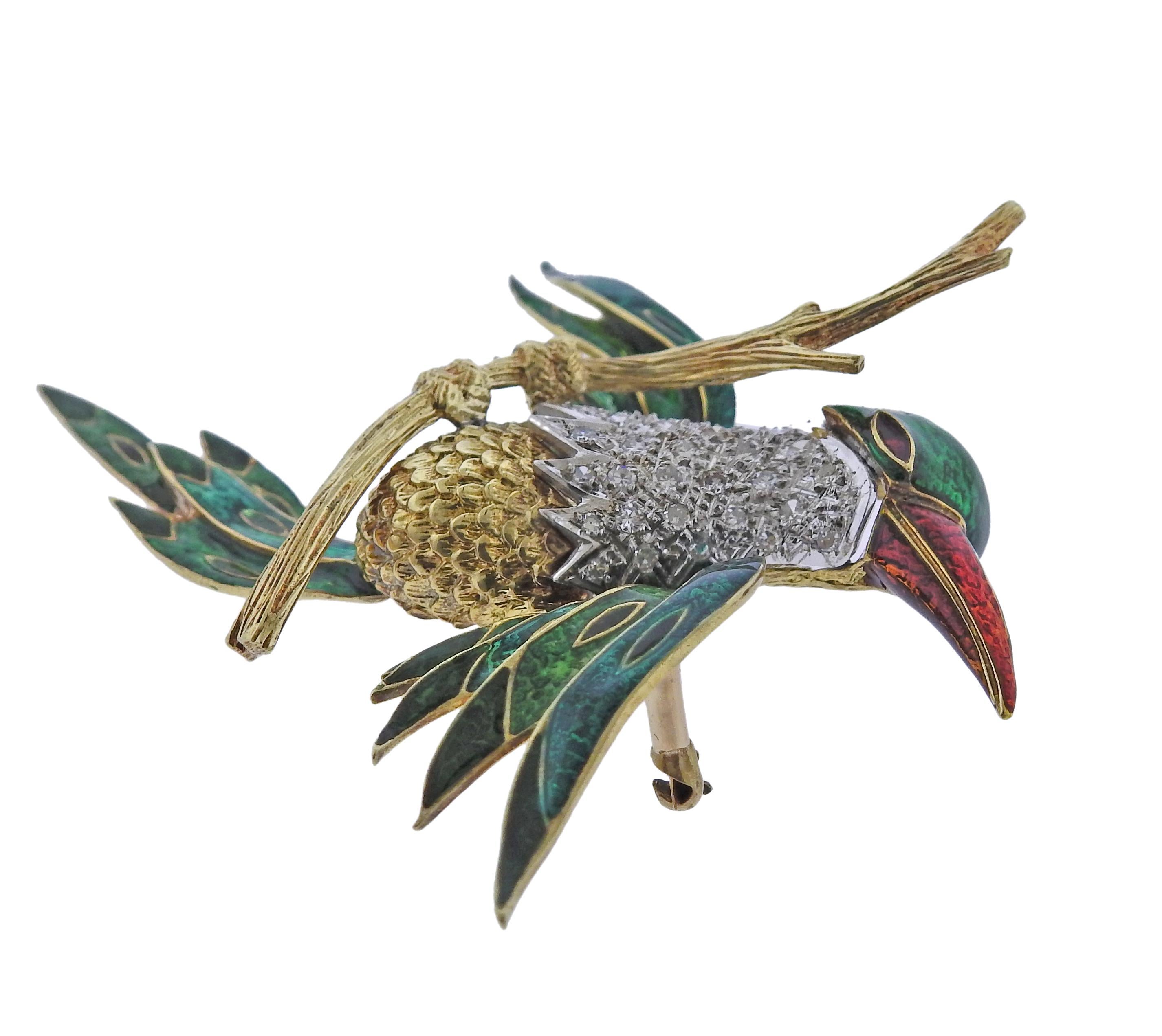 18k gold bird brooch, decorated with enamel and approx. 0.86ctw in diamonds. Brooch measures 72mm x 68mm. Weight - 27.6 grams.