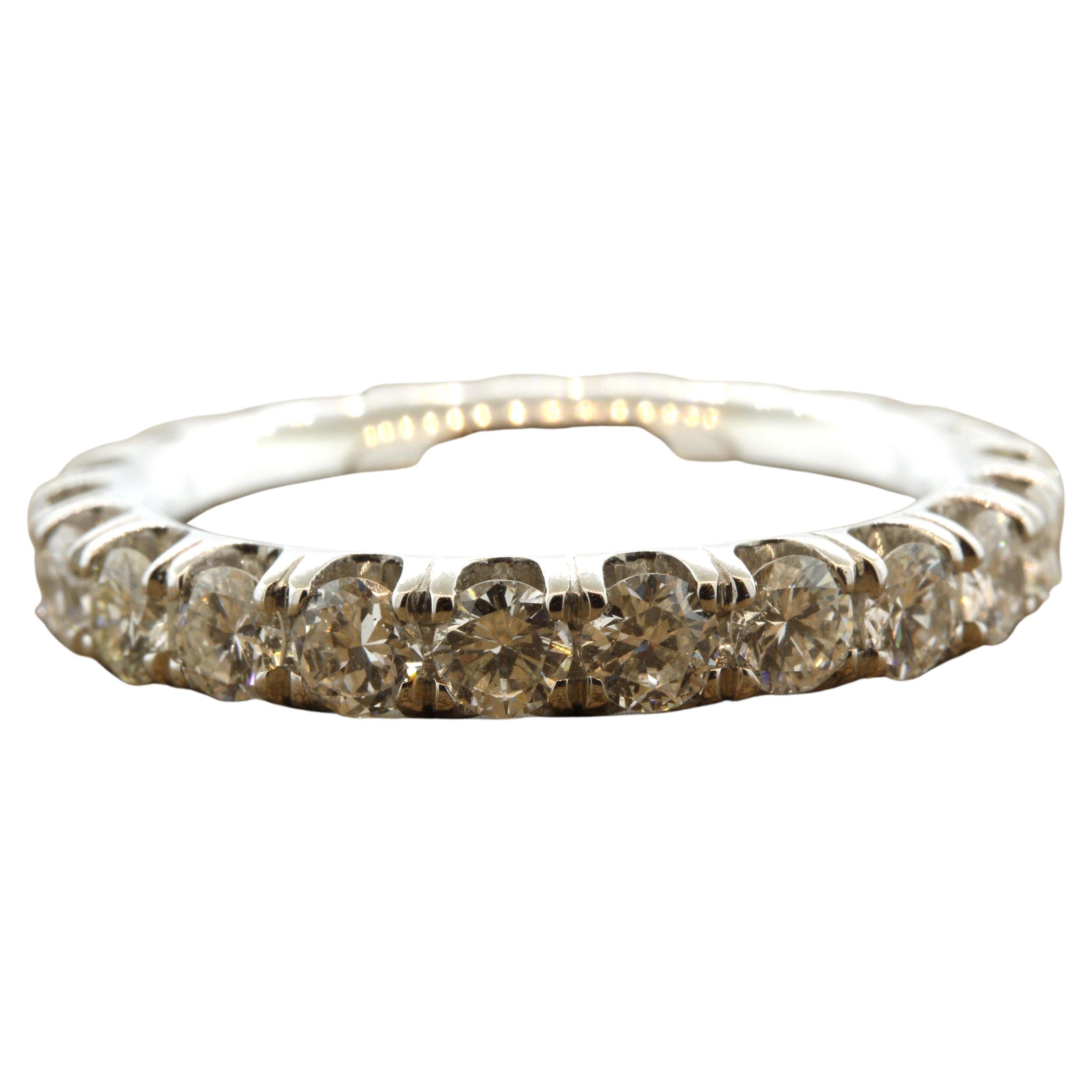 A classic diamond eternity ring featuring 2.34 carats of round brilliant-cut diamonds. They are perfectly matching in size and color making it an impressive array of diamonds. Made in 14k white gold and ready to be worn.

Ring Size 6.25

Weight: 4.8