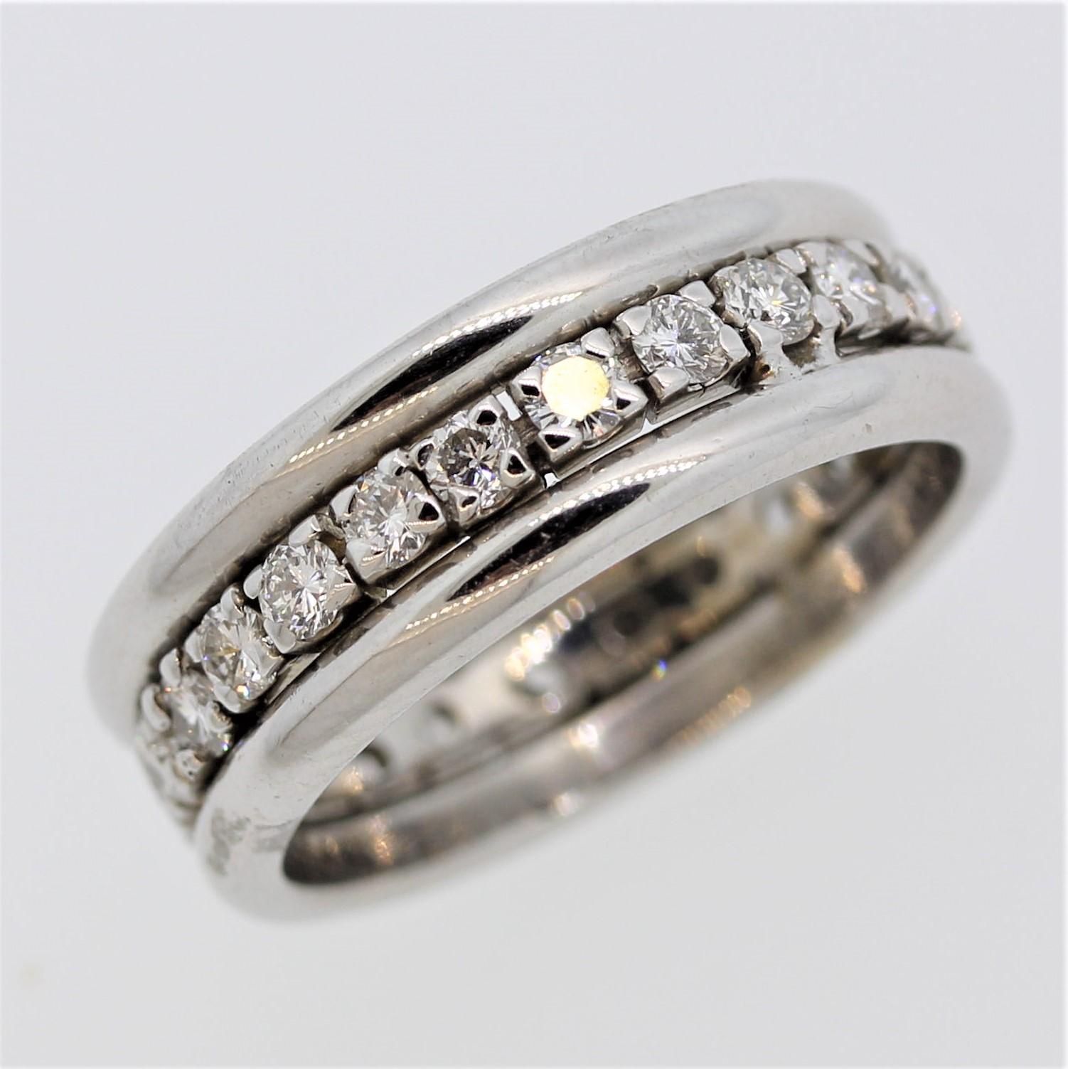 A unique styled eternity band. It features 1.50 carats of round brilliant cut diamonds set around the entirety of the ring. Made in 14k white gold.

Ring Size 7.75