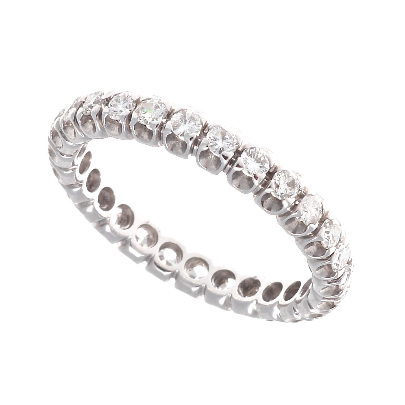 Eternity ring, also known as infinity ring, is designed as a symbol of everlasting love as well as the ‘eternity’ a couple plan to share together. Designed with numerous near colorless diamonds orbiting the elegantly crafted 18k gold ring. Ring size