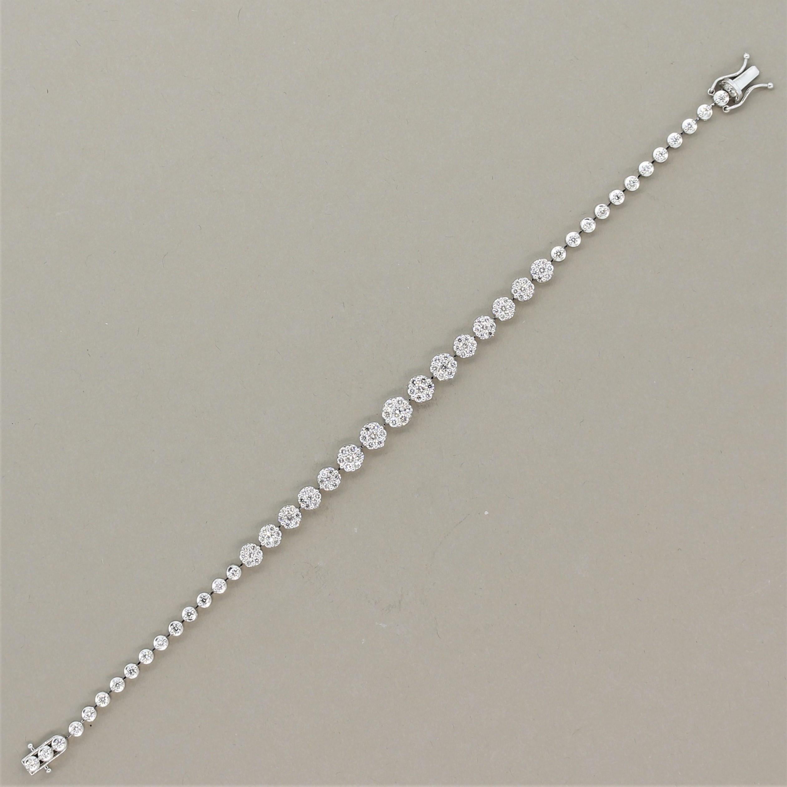 A simple yet chic bracelet made in 18k white gold. It features 2.57 carats of round brilliant cut diamonds with a potion of them set in a floral pattern in the center of the bracelet. Made in 18k white gold and excellently crafted.

Length: 7 inches