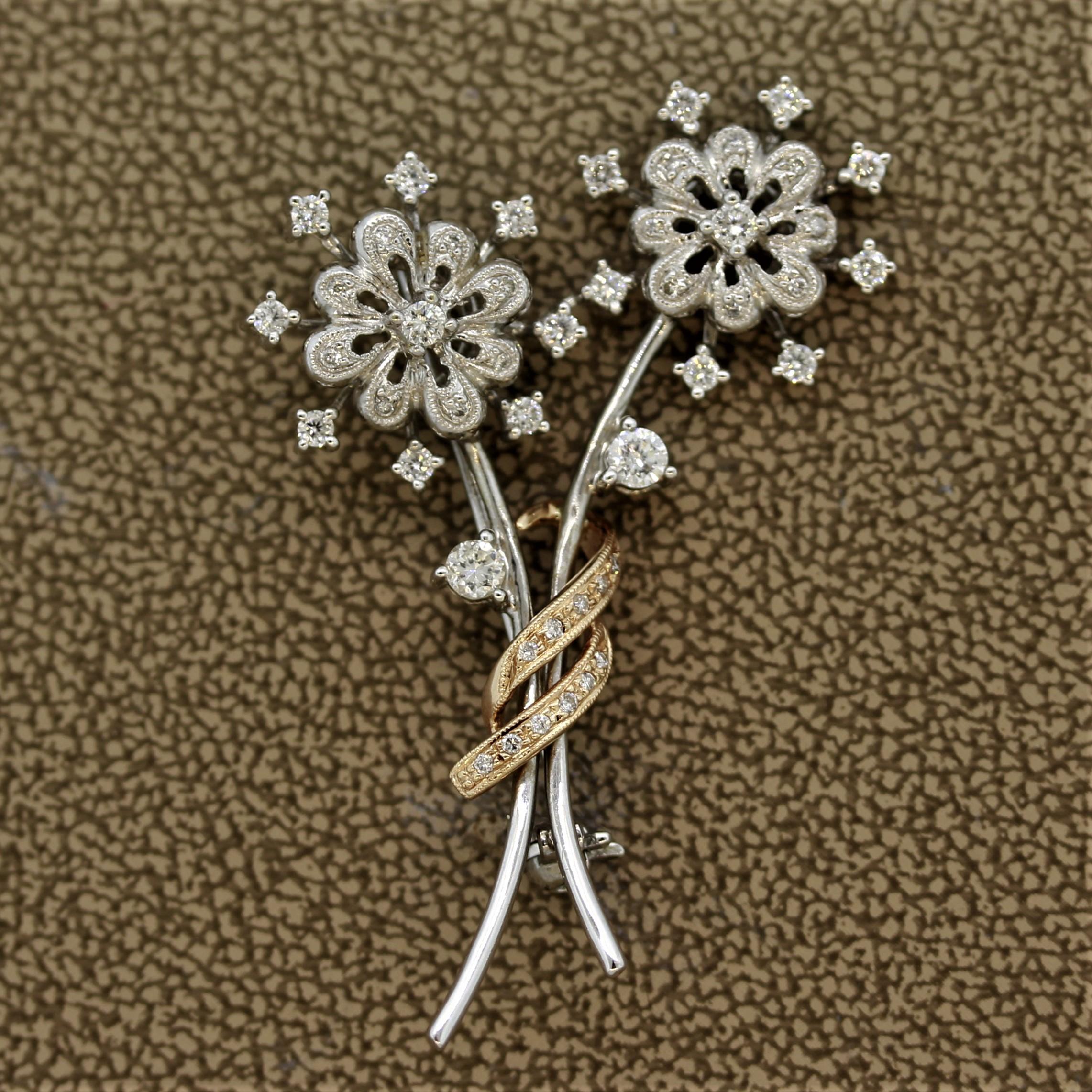 A sweet pin of a two-flower bouquet. They feature 0.75 carats of round brilliant cut diamonds set in 18k white and rose gold. Small enough to be worn daily and with multiple outfits.

Length: 1.9 inches