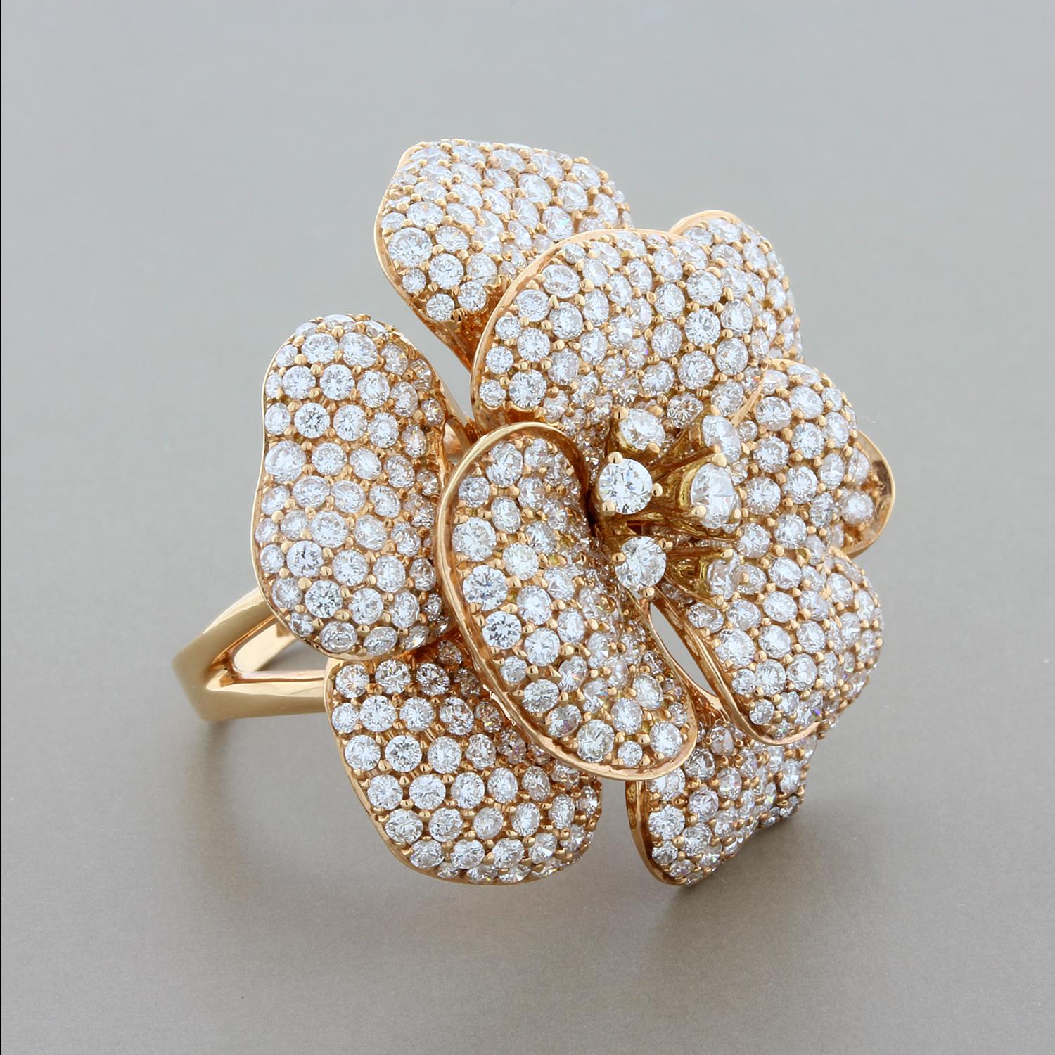 This ring features 6.11 carats of VS clarity colorless diamond pavé. Beautiful modern flower design, each petal is covered with diamonds, set in 18K rose gold.

Ring Size 6
