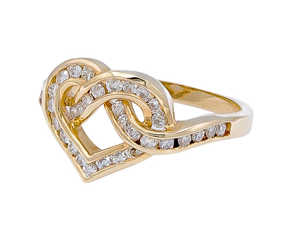 This dainty intertwined heart shaped ring is so sweet! Containing 35 round brilliant cut diamonds that approximately weighs .56 carats. Set in 18K yellow gold. 

Stamped 18K

Ring Size: 6.5