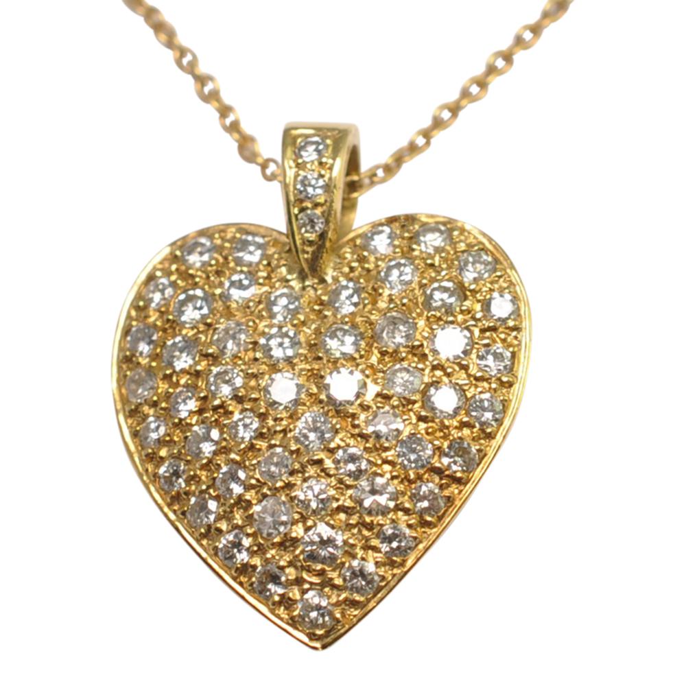 Pretty diamond heart pendant in 18ct gold; the pendant is hand made and is set with 0.80ct of brilliant cut diamonds.  Tested as 18ct gold and supplied with a fine Italian 18ct gold chain by UnoAErre.  This would make a lovely item of wedding