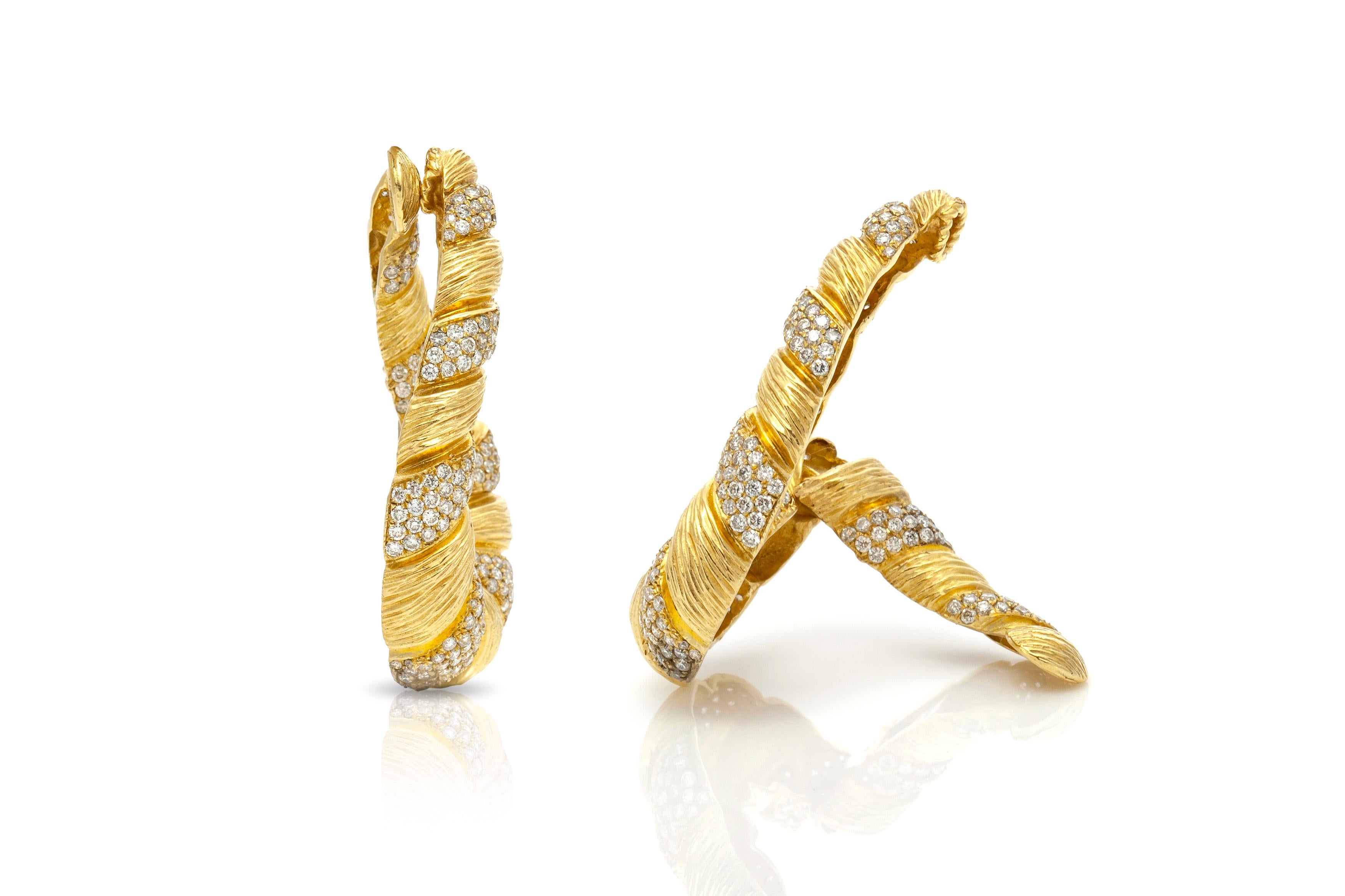 Hoop earrings, finely crafted in 18k yellow gold with diamonds weighing approximately a total of 6.50 carats. Circa 1970's.