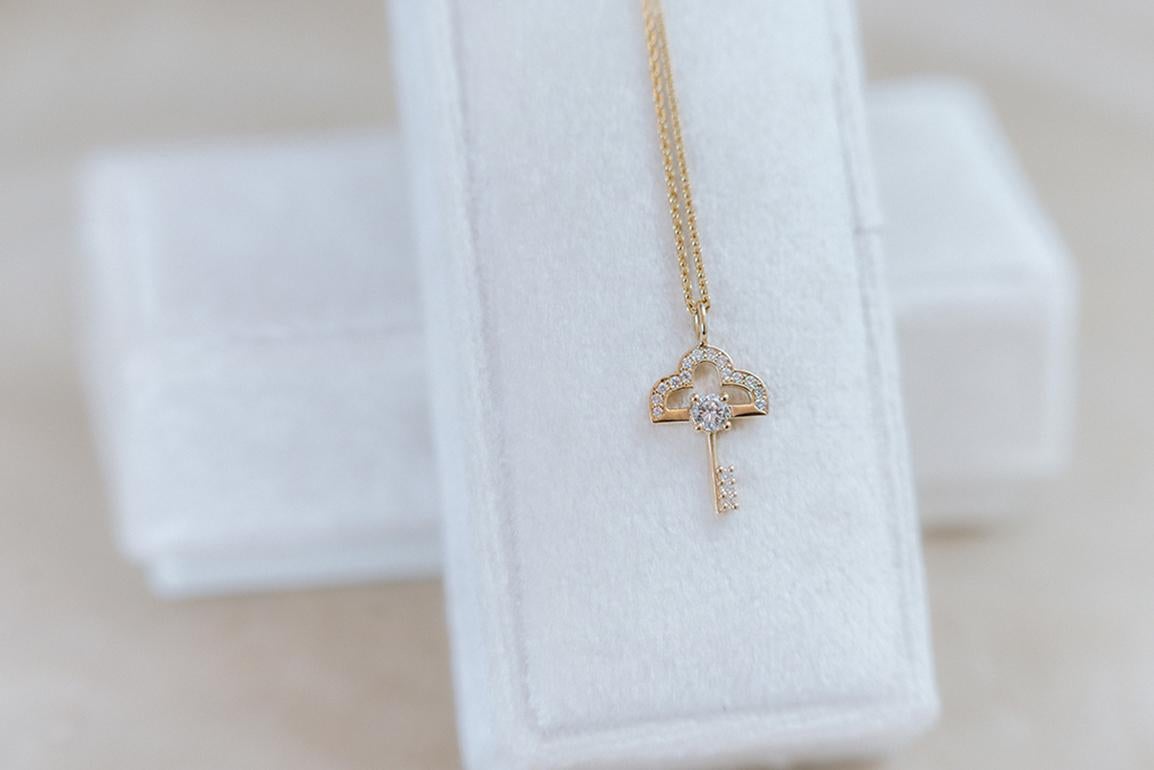 Necklace with natural diamonds in 14k yellow gold.

Diamonds 0.27ct total weight.

Chain 16”, dimensions of the key 1.5cm x 1cm.