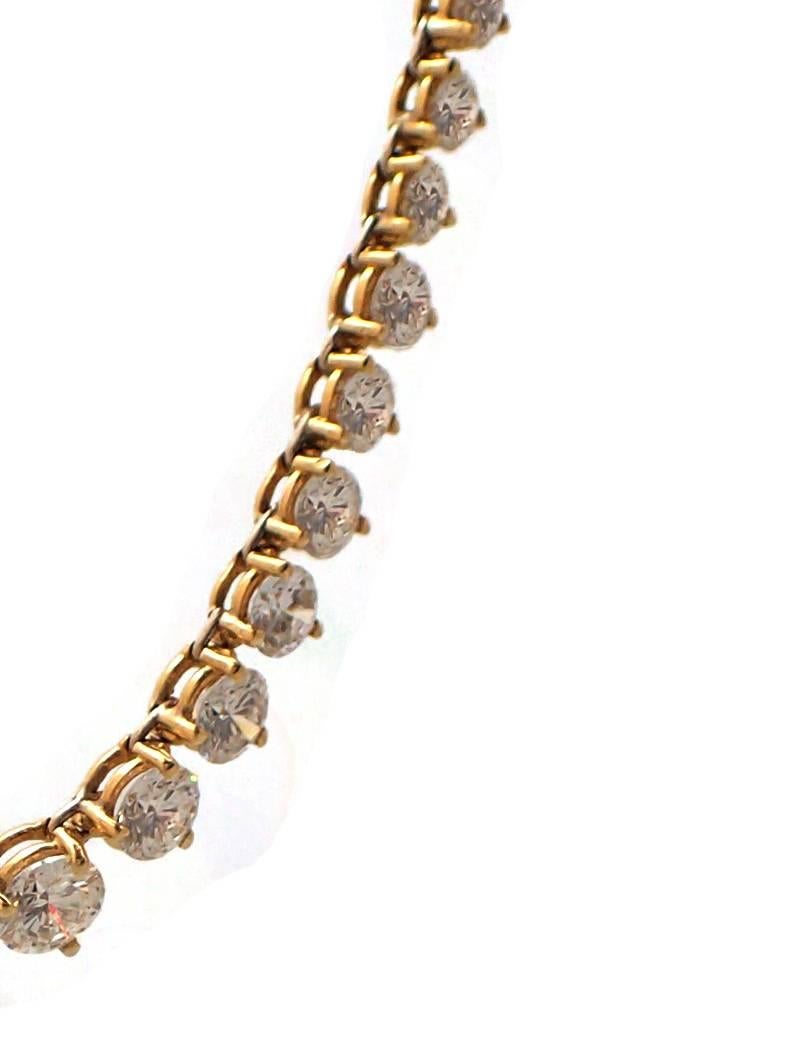 Opt for a classic look with this beautiful 18k Yellow Gold Diamond Riviera necklace. Featuring over a hundred stunning graduated round diamonds, this piece will easily become your go-to accessory! This gorgeous piece features 102 round diamonds with