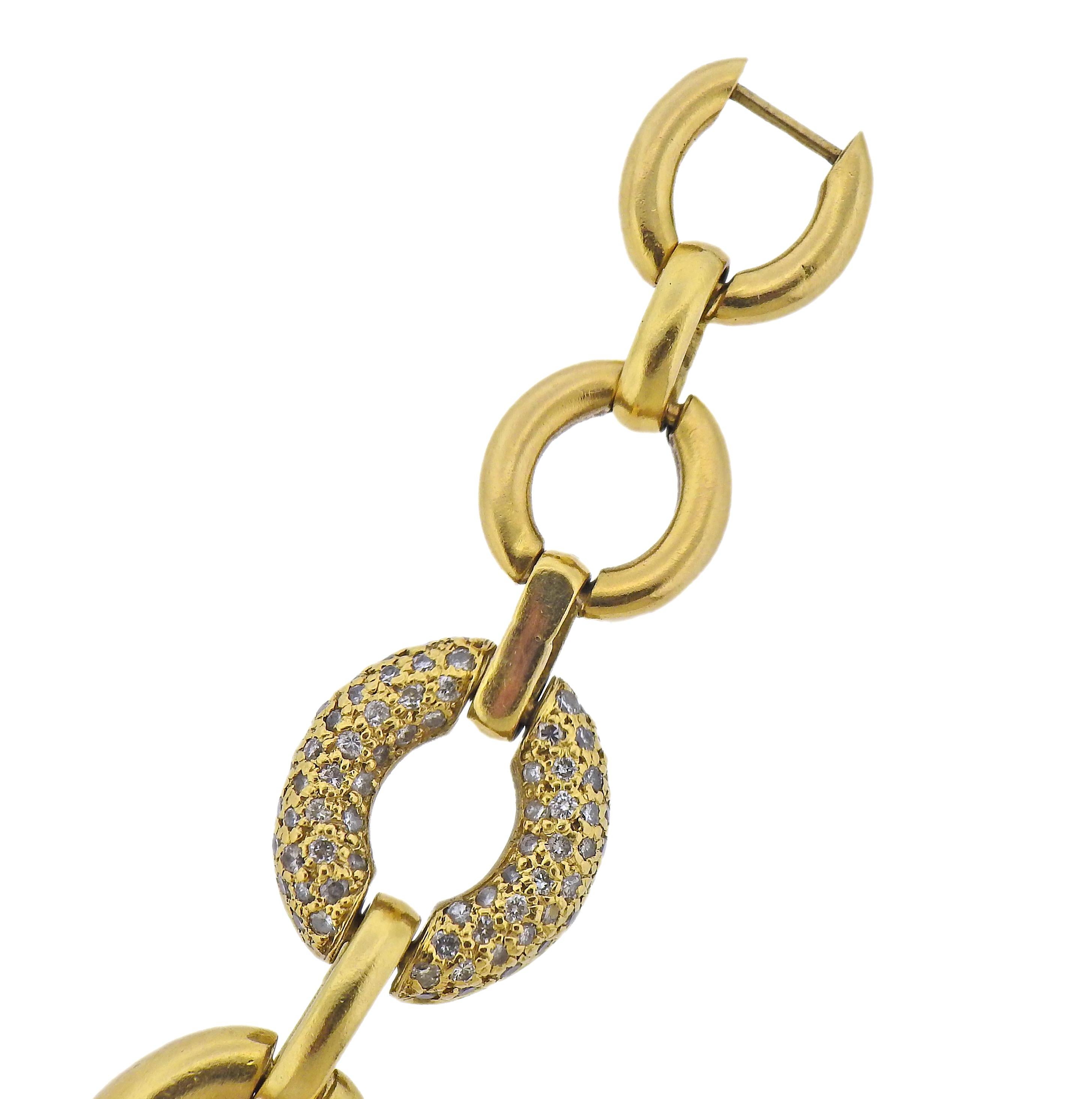 Shawn signed 18k gold oval link bracelet with approx. 1.40ctw in diamonds. Bracelet is 7.25
