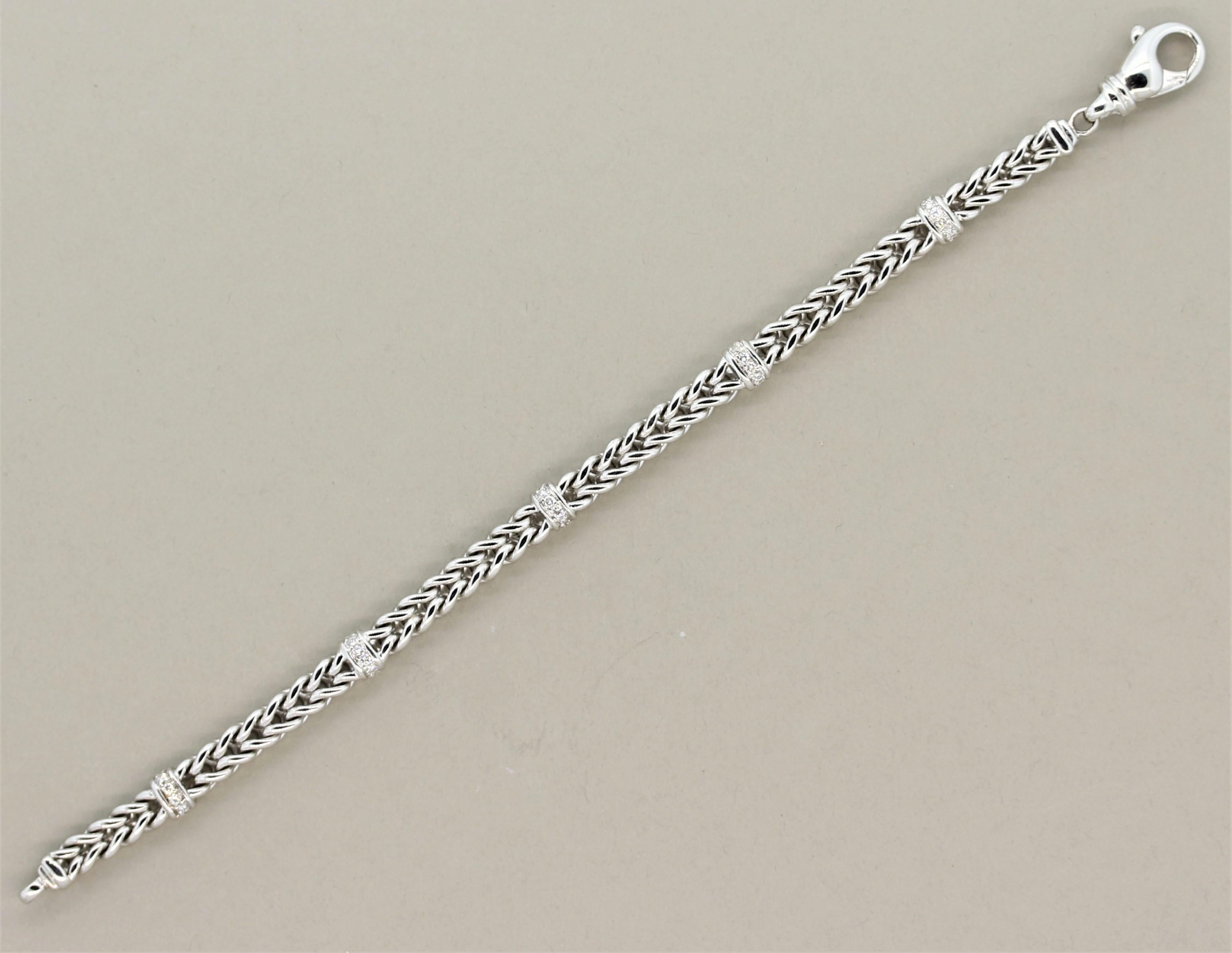 A classy white gold bracelet featuring 0.42 carats of round brilliant cut diamonds. The bracelet is made of links of 14k white gold that are interlocked and have the slightest of stretches.

Length: 7.5 inches