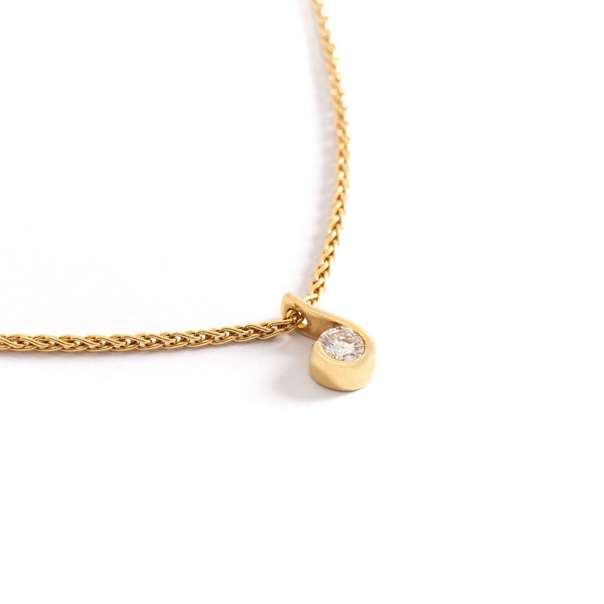 Diamond yellow gold chain necklace.
Diamond estimated weight: 0.41 carat.
Pendant length: 1.00 centimeter.
Chain length: 41.00 centimeters.
Gross weight: 6.54 grams
