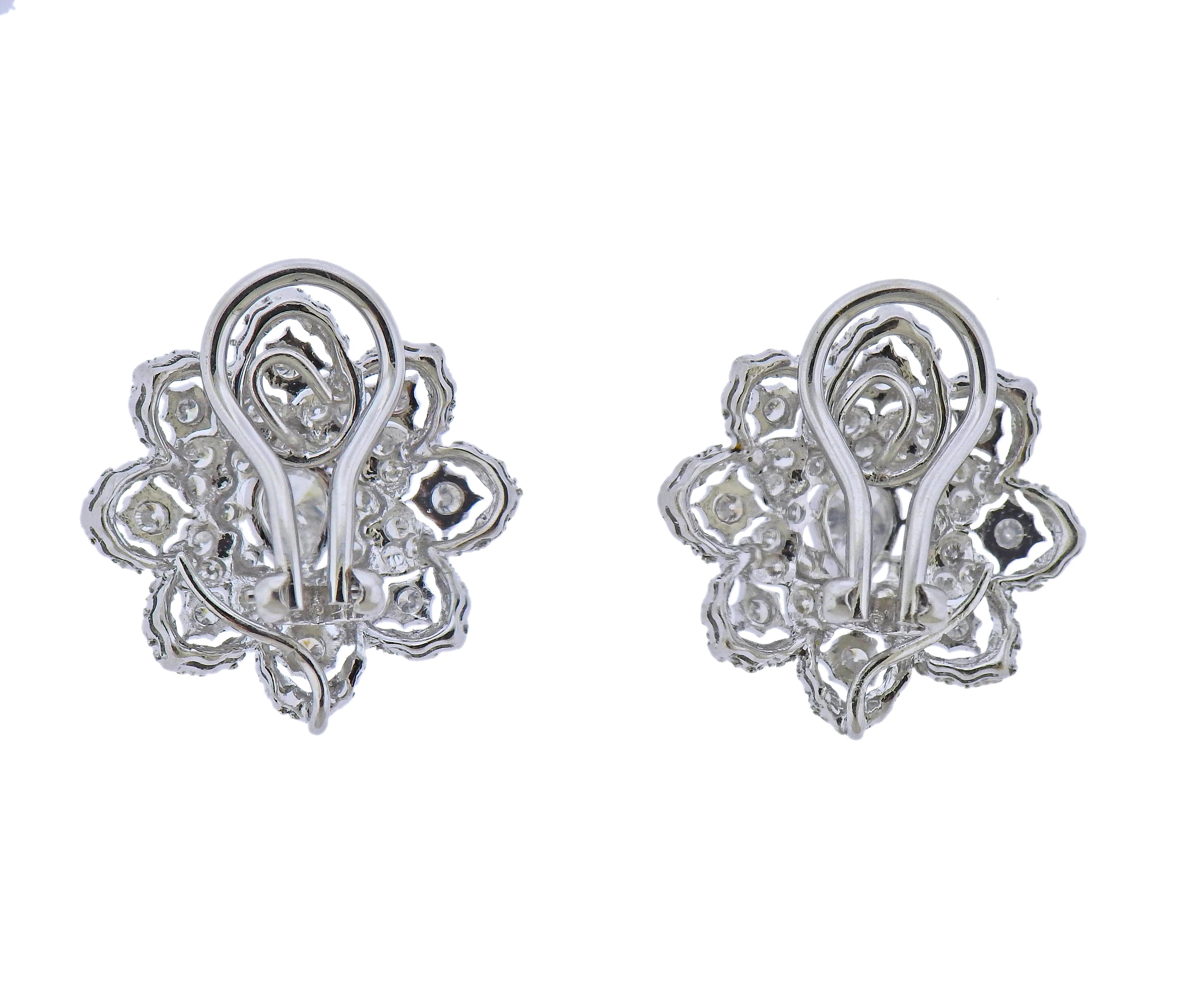 Pair of 18k white gold openwork earrings, set with approx. 1.30-1.40ctw in diamonds. Earrings are 20mm x 21mm. Weight - 10.2 grams. Marked 750.