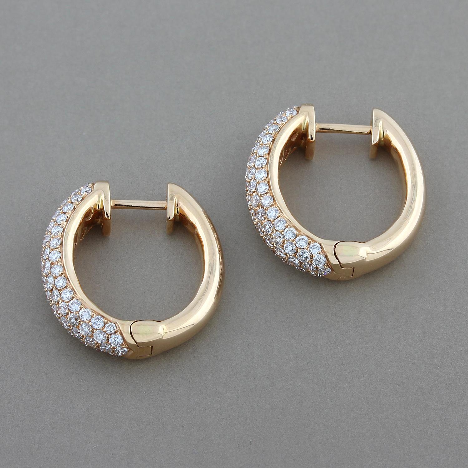 The perfect pair of hoop earrings that can be worn casually or dressed up for a night out. They feature 1.59 carats of VS quality round cut pave set diamonds in 18K rose gold.

Earring Length: 0.75 inches
Earring Width: 0.70 inches