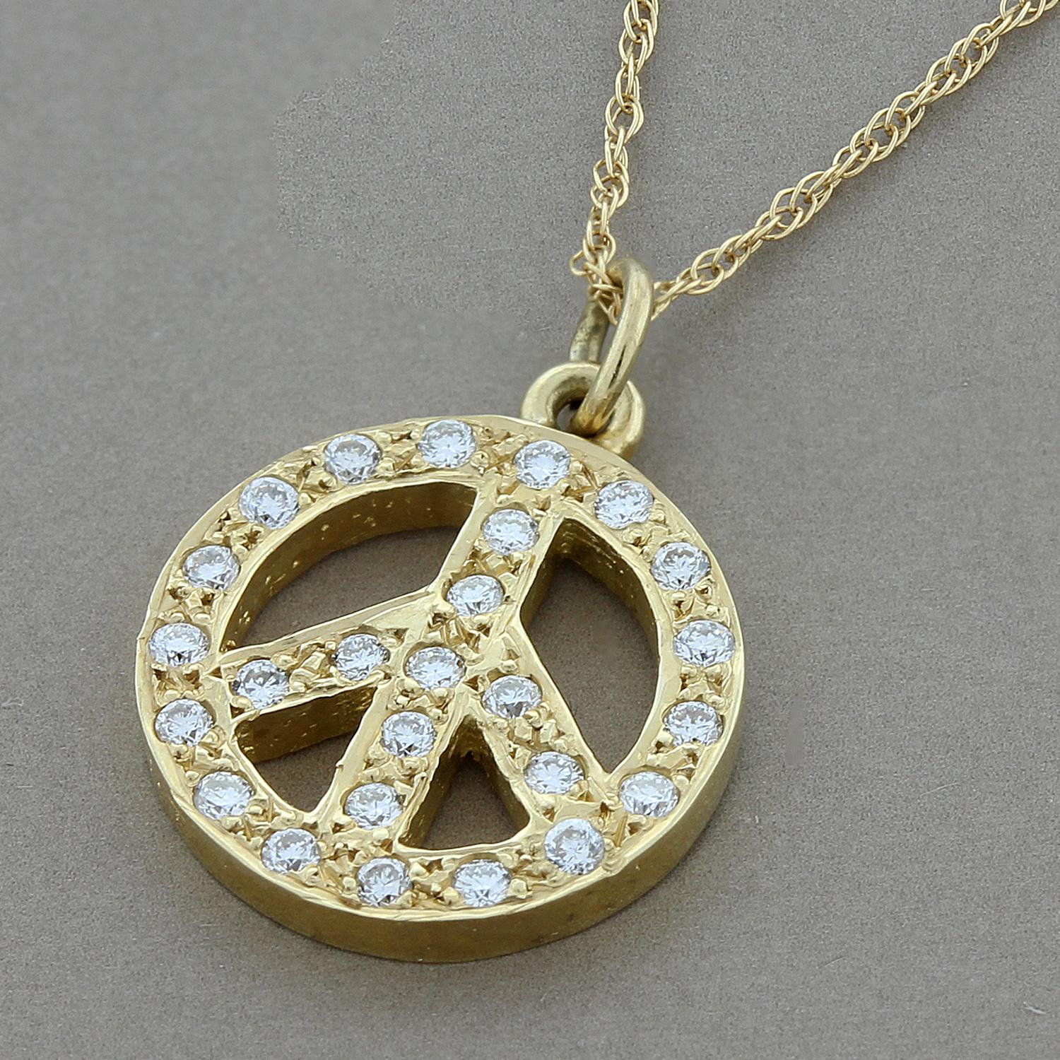 A classic peace sign pendant featuring 0.20 carats of diamonds. Set in 14K yellow gold. Peace out!

Chain Length: 18 inches

Pendant Length: 5/8 inch

Pendant Width: ½ inch