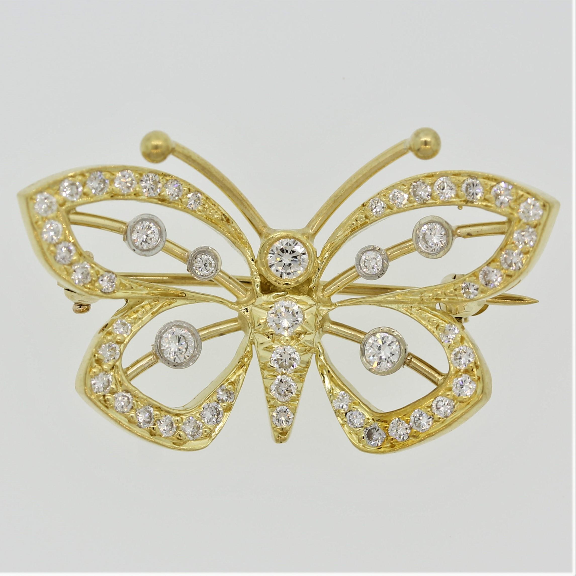 A beautiful and free butterfly featuring 0.93 carat of round brilliant cut diamonds. They are set in 18k yellow gold as well as bezel set in platinum in the center of the wings.

Length: 1.2 inches