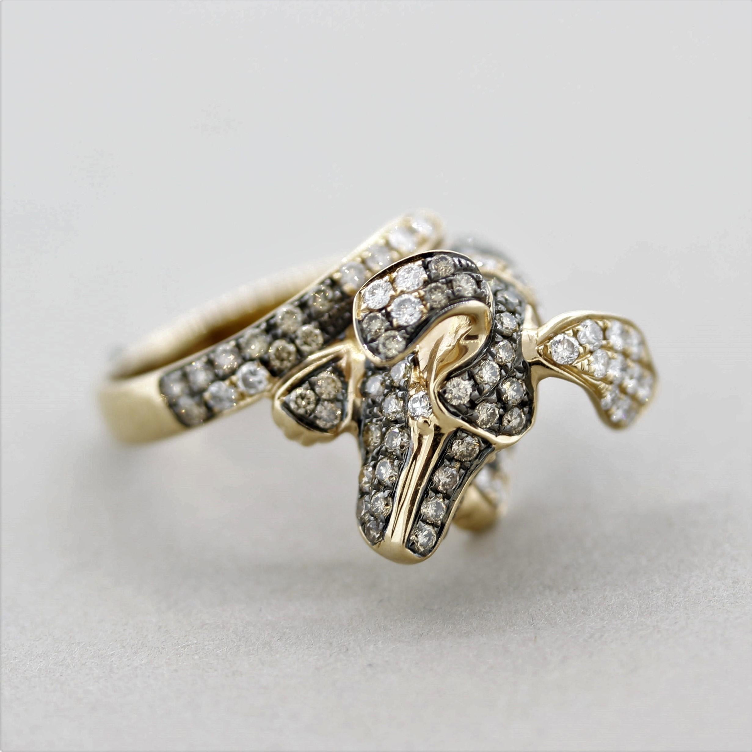 A sweet and stylish ring! It features 1.42 carats of white and fancy colored round brilliant-cut diamonds. The ring is shaped into a sweet dog with big floppy ears set with diamonds. Made in 18k rose gold with black rhodium accents.

Ring Size 6.50