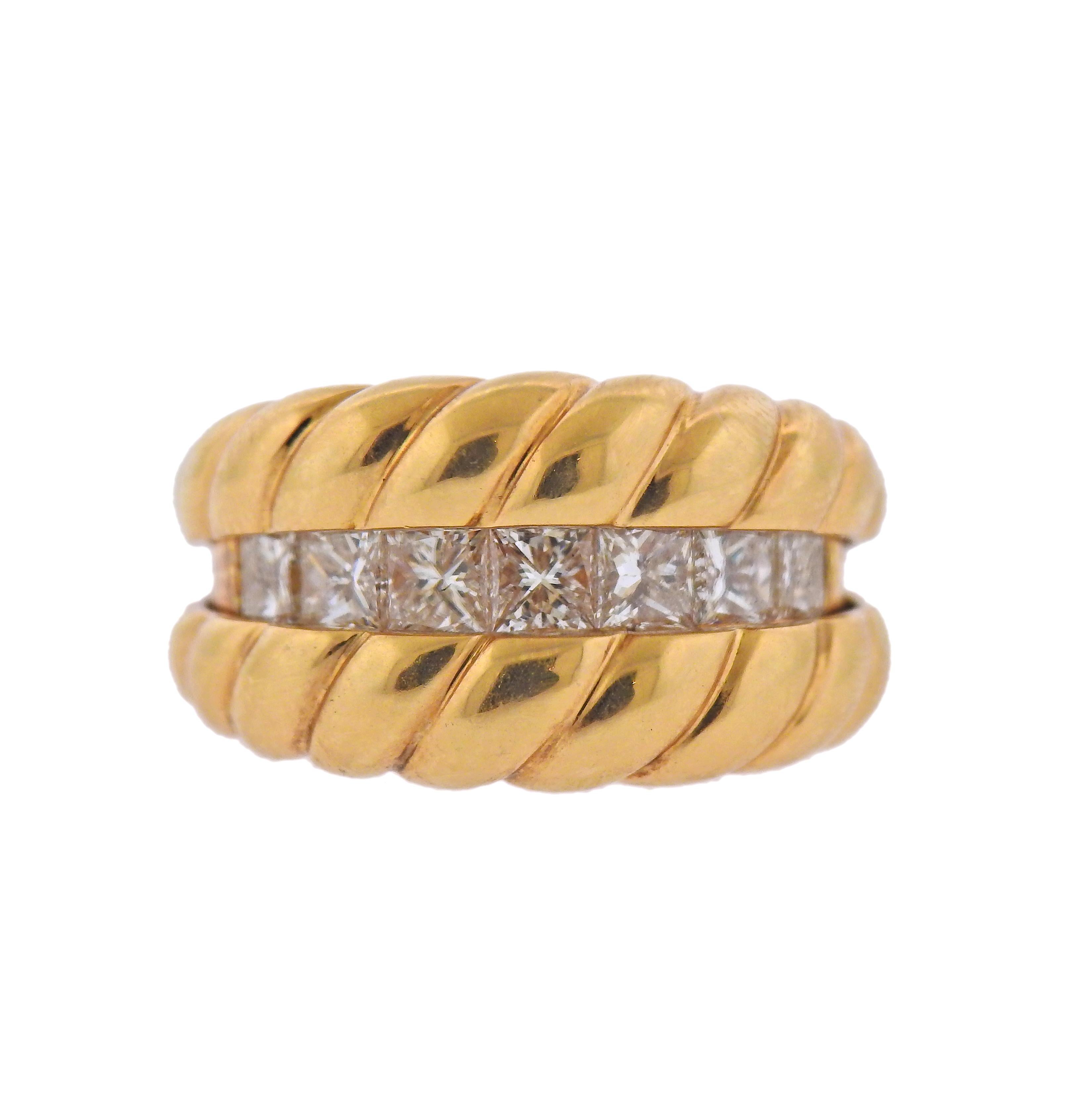 Whimsical 18k gold ring with a total of 1.75ctw in diamonds. Ring top opens and closes, revealing the diamonds. Can be worn both ways. Ring size - 6, ring top is 10.5mm (when closed). Marked: 750, D1.75ct. Weight - 14.2 grams. 