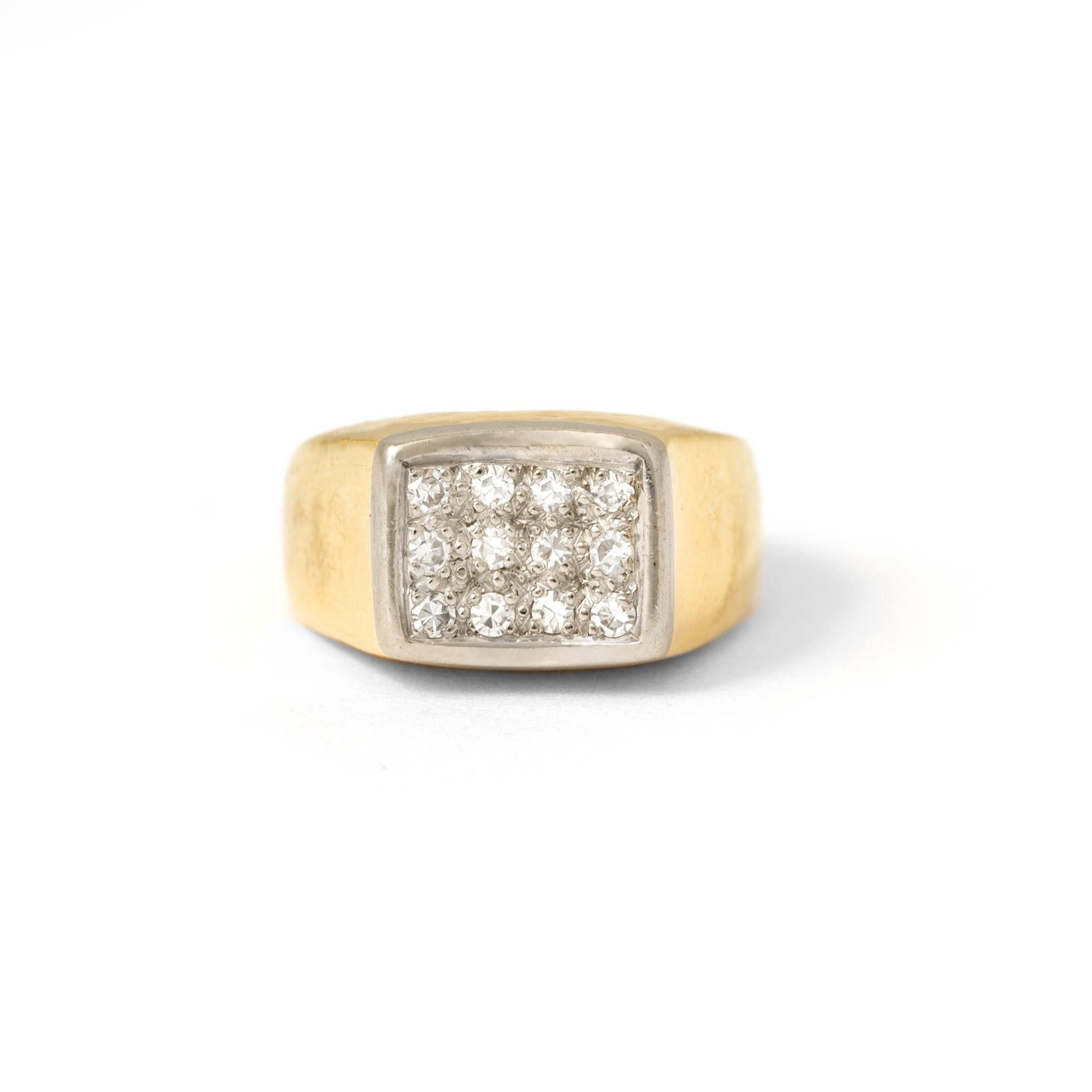 18K yellow and white gold ring with diamonds. 
Main pattern dimensions: 8.37 x 10.03 mm. 
Size: 43.5. 
Gross weight: 5.36 grams.