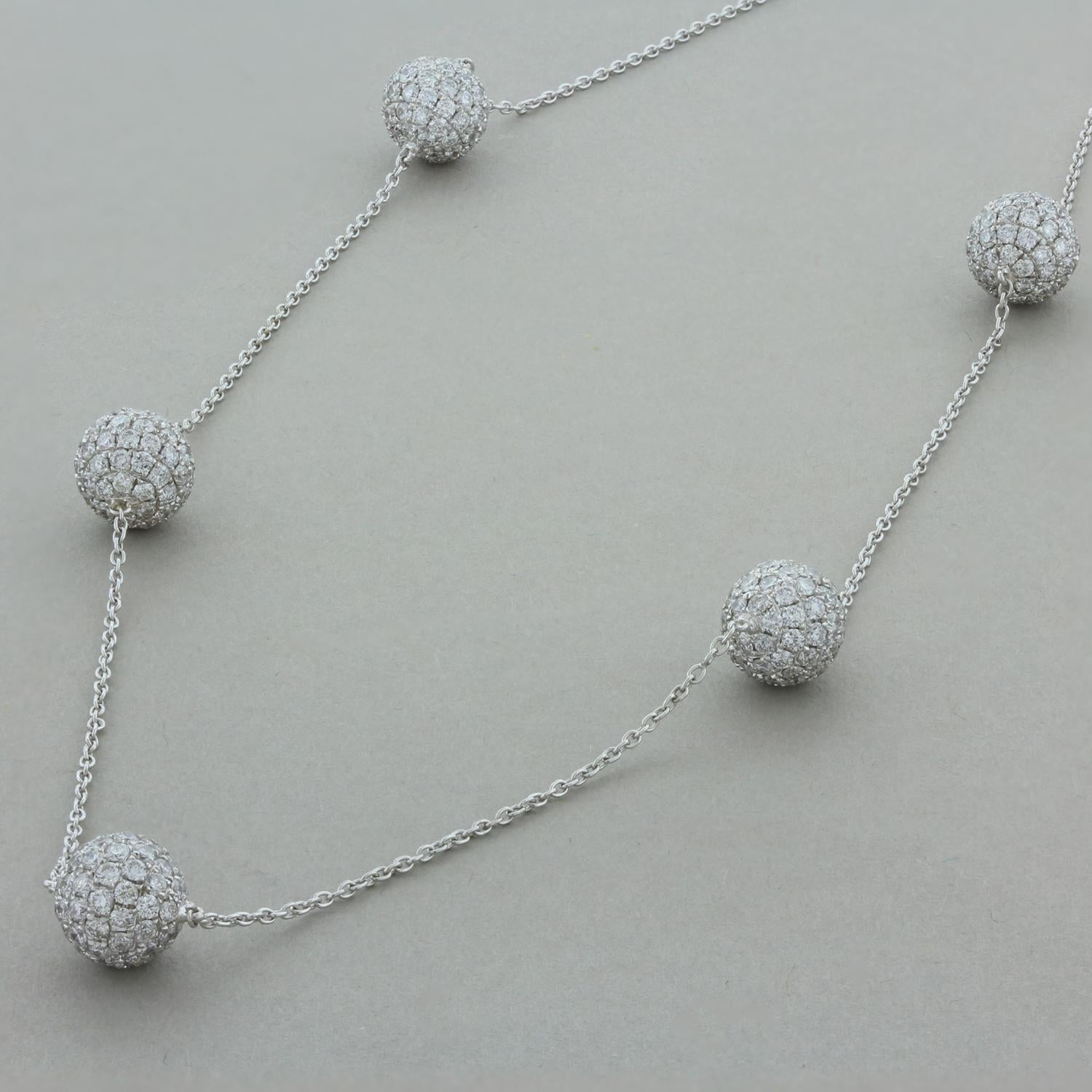 This lively necklace encompasses five spheres that are pave set with 5.63 carats of diamonds. The round brilliant but diamonds are all VS quality and set in 14K white gold. A simple yet elegant necklace that can be worn with many outfits.

Necklace