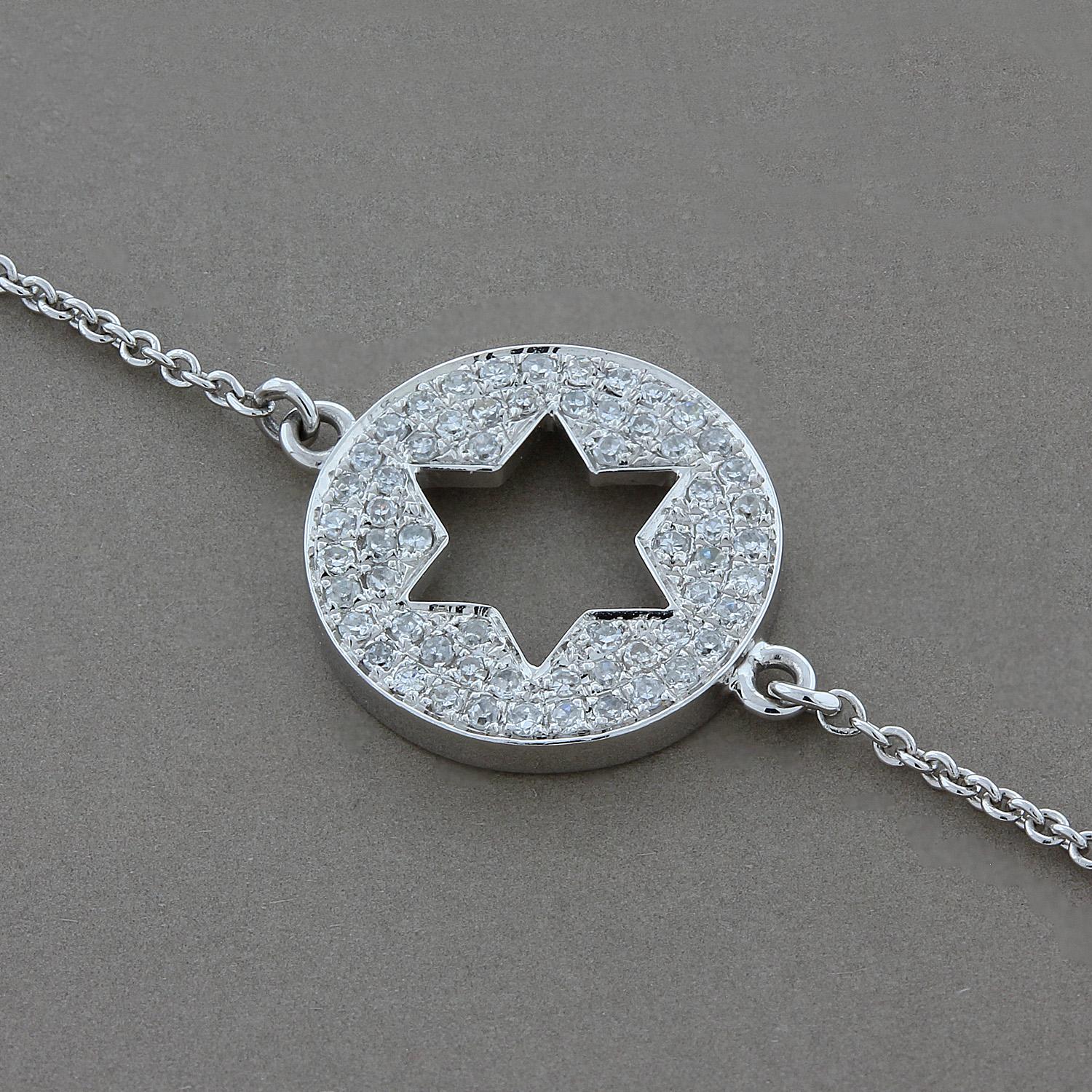 This delicate cutout of a star bracelet features 0.15 carats of pave set diamonds on a 14K white gold chain. A comfortable everyday piece to stack or wear alone.

Adjustable chain with sizing loops to fits wrists up to 6 ½ inches and 7 ½ inches.
