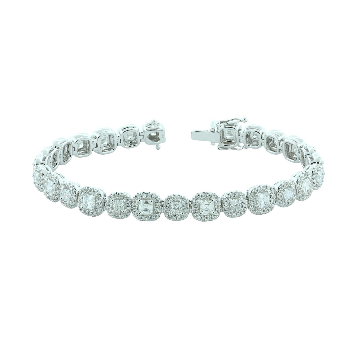 An exceptional bracelet featuring 4.41 carats of sparkling white VS quality princess cut diamonds haloed by 1.65 carats of VVS quality round cut white diamonds. Set in 18K white gold with a box clasp and two safety latches.

Length: 7 inches