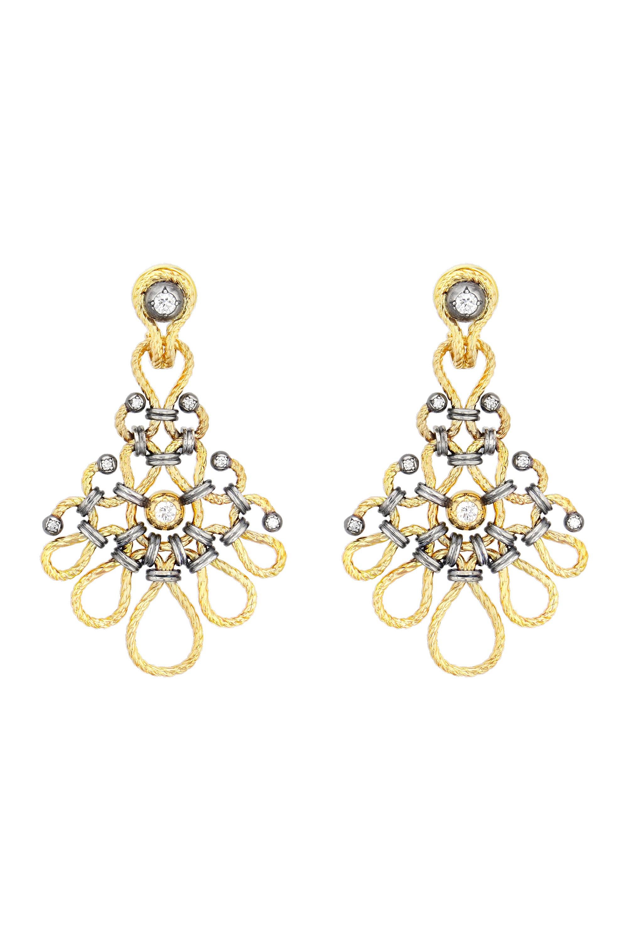 Earrings, serpentine twists in yellow gold punctuated with gold and silver balls set with a diamond held by a set of distressed silver rings.

Details:
GVS Diamonds: 0.76 cts
18k Yellow Gold : 27 g
925 Distressed Silver : 8 g
Made in France