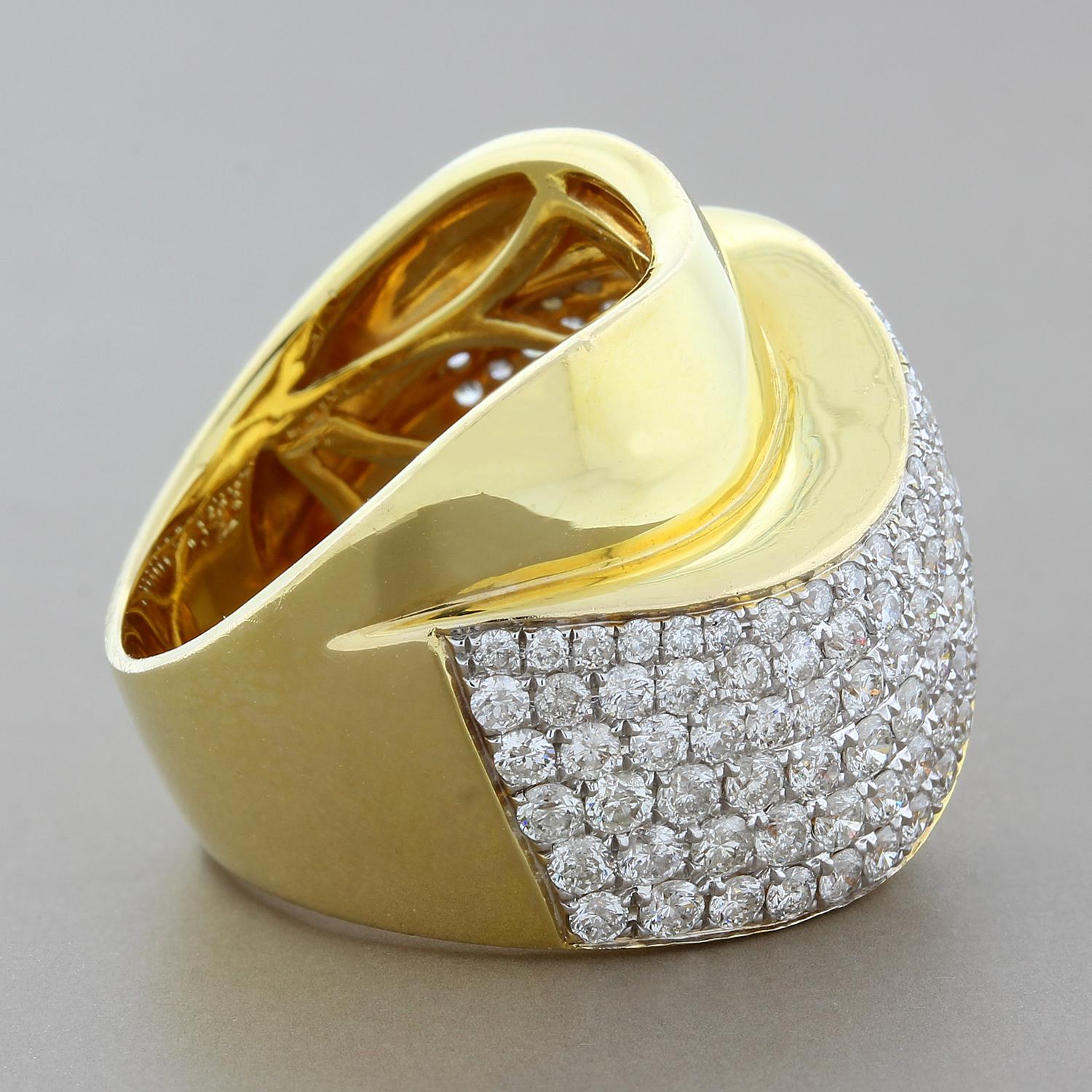 A unique band with a wave of high polish 14K yellow gold and white VS quality diamonds weighing 1.78 carats. The diamonds are set half circle around the ring.  It is super comfortable and a great addition to any outfit, day or night!

Currently ring