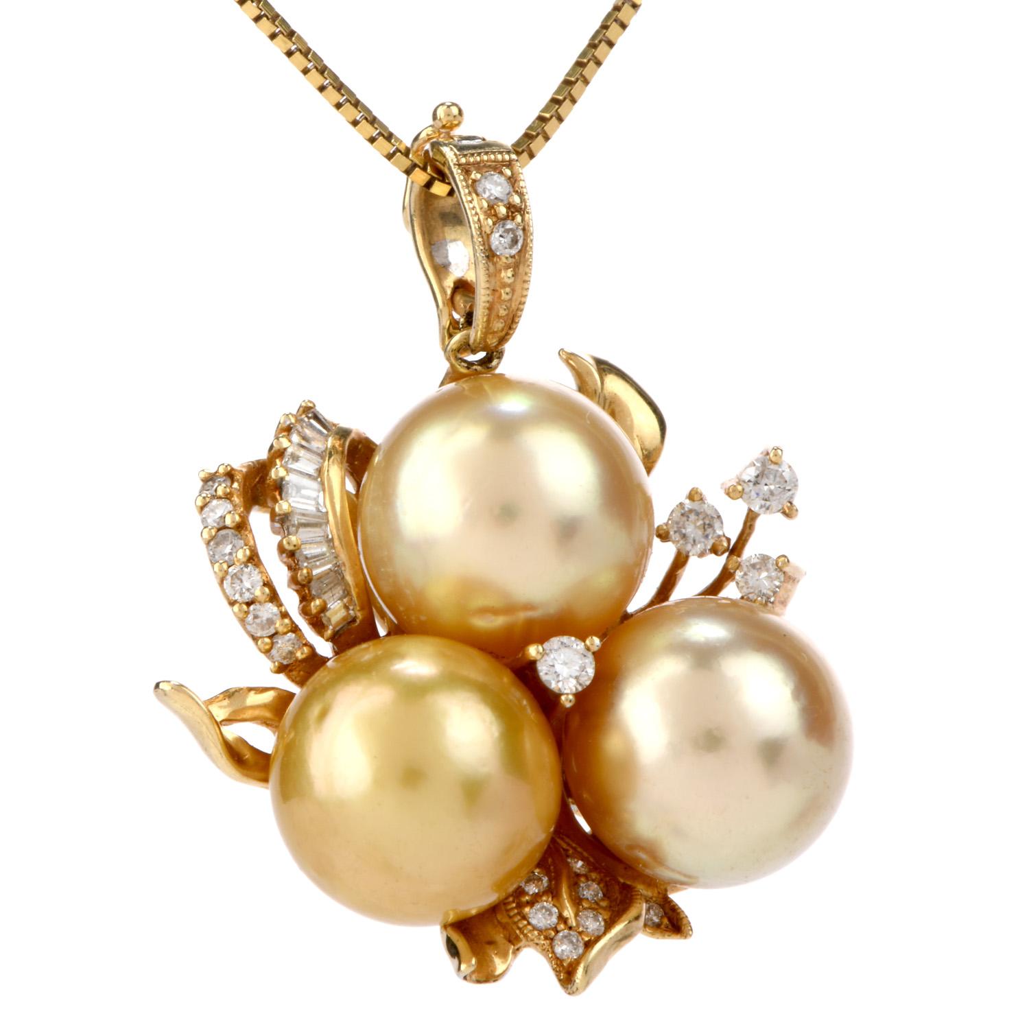 This diamond & pearl pendant enhancer crafted in solid 14 karat yellow gold incorporates a captivating floral motif profile resplendent in 0.65 carats of round and baguette cut  diamonds graded H-I color and VS clarity, surmounting an eye-catching