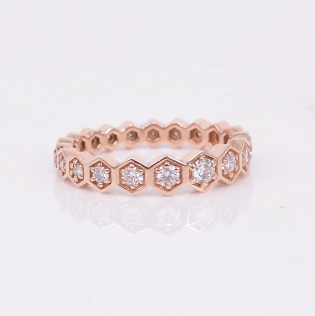 A truly remarkable diamond eternity band with .51 carats of diamonds that graduate in size all around!  Set in 14k rose gold. This band looks amazing when worn separately or stacked with other bands! Ring size is a 7.

Additional sizes available