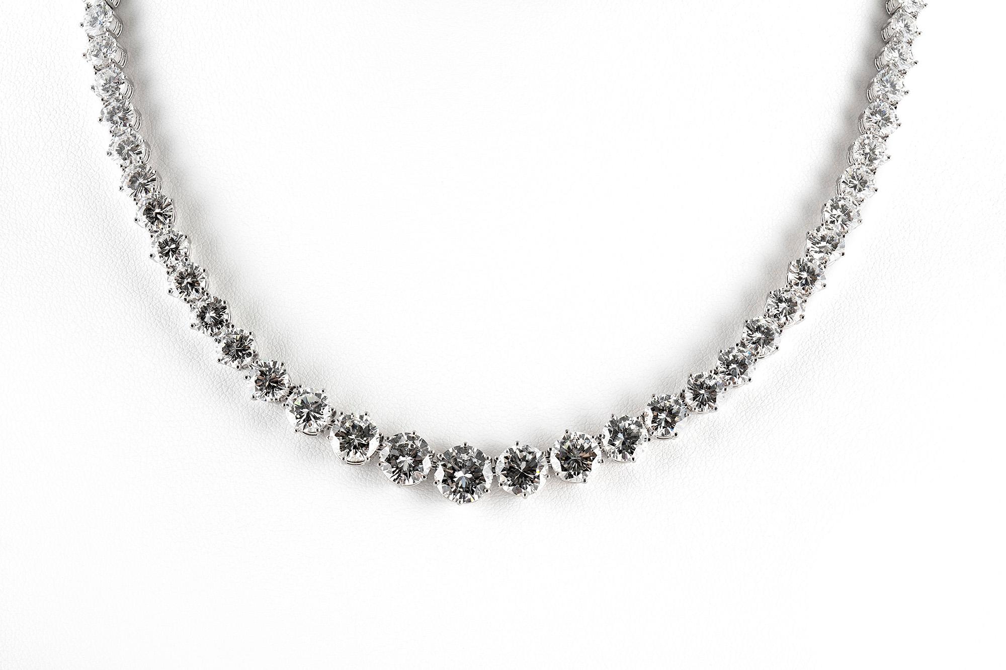 Diamond riviera necklace, finely crafted in platinum, featuring Round Brilliant cut diamonds, weighing a total of approximately 41.00 carat. The 7 front stones are GIA certified; 2.06 carat F color SI1 clarity, 1.57 carat D color VS1 vlarity, 1.50