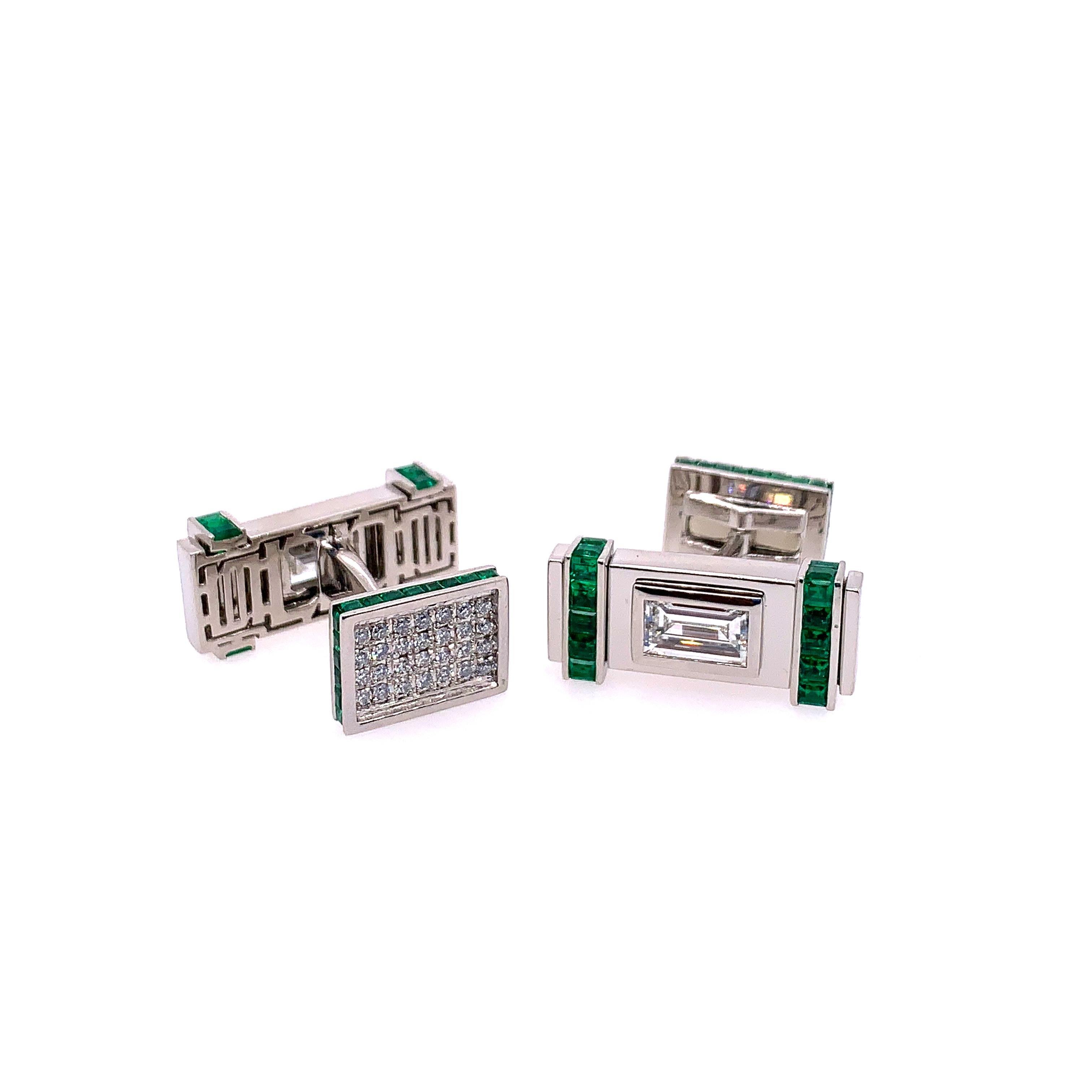 These cufflinks feature two Baguette cut diamonds, one weighing 1.11  and the other weighing 1.08 carats. (GIA Certified)

These beautiful diamonds are mounted with Carre-cut Emeralds totaling 2.60 carats and collection pavé diamonds weighing .30